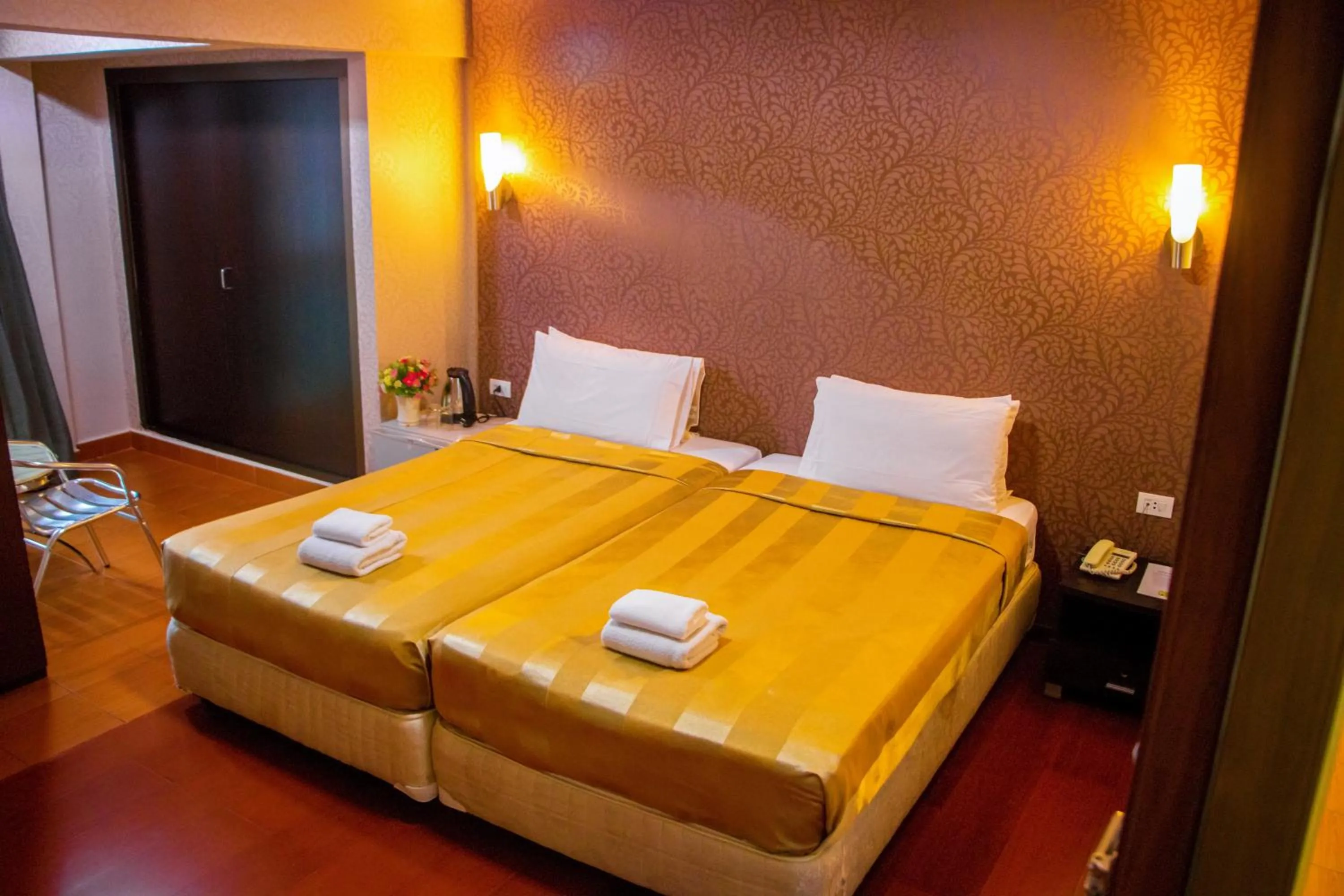 Bed in Visiting Card Hotel & Resort