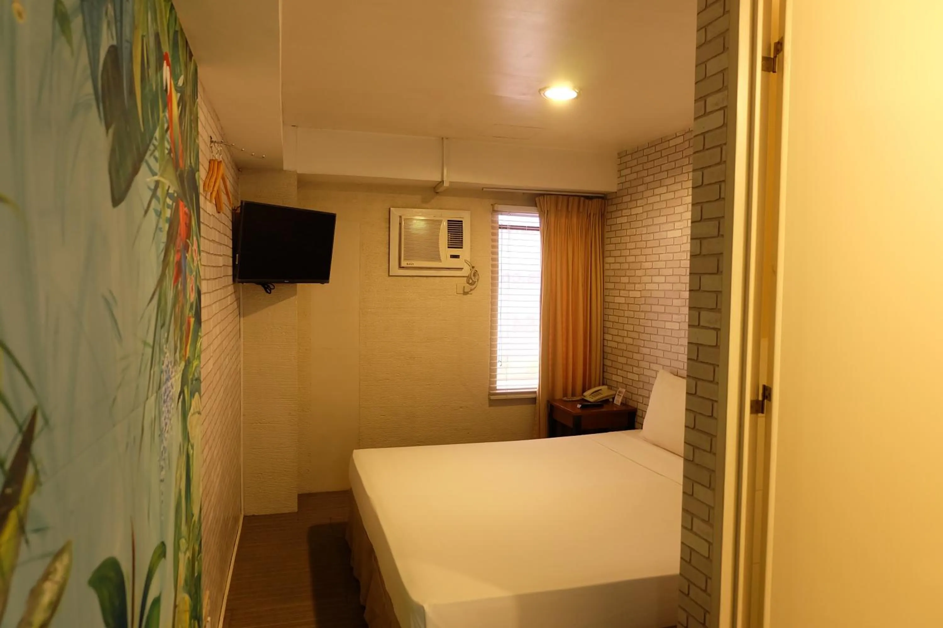 Bedroom, Bed in Spaces Hotel Makati