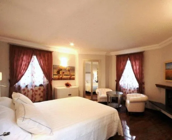 Bedroom in Sangallo Hotel