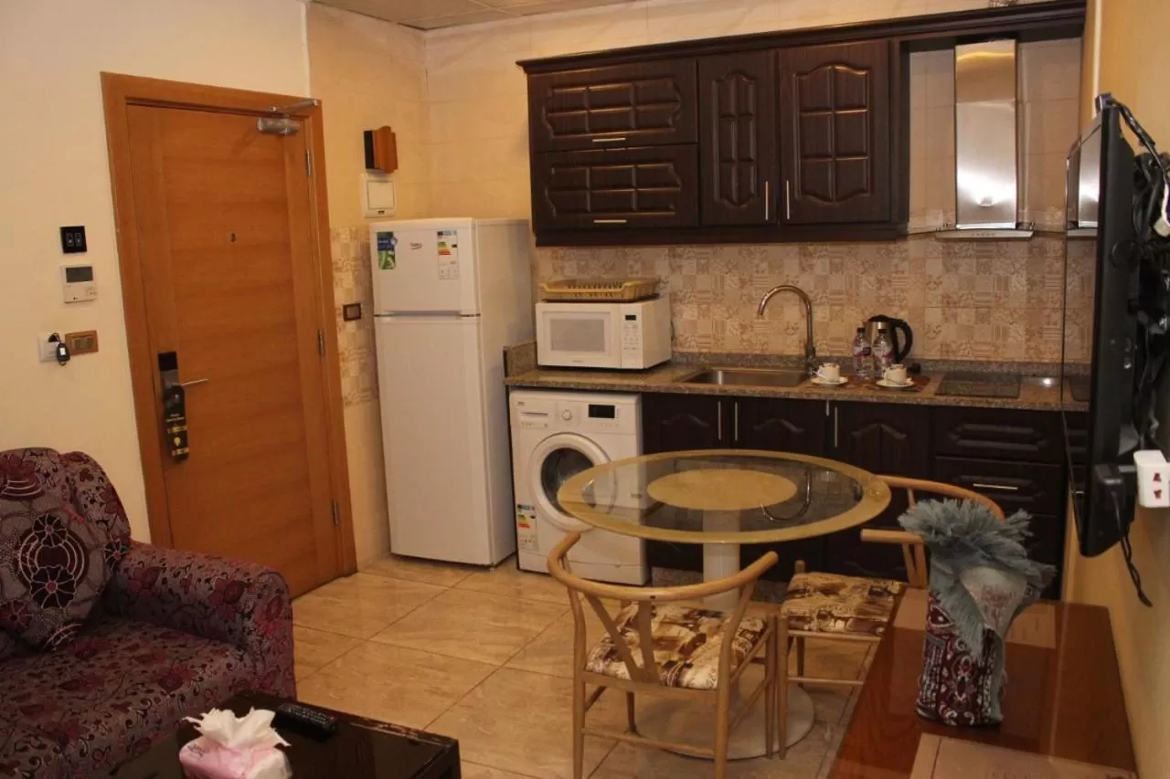 Kitchen or kitchenette, Kitchen/Kitchenette in Jawharet Alswefiah Hotel Suites