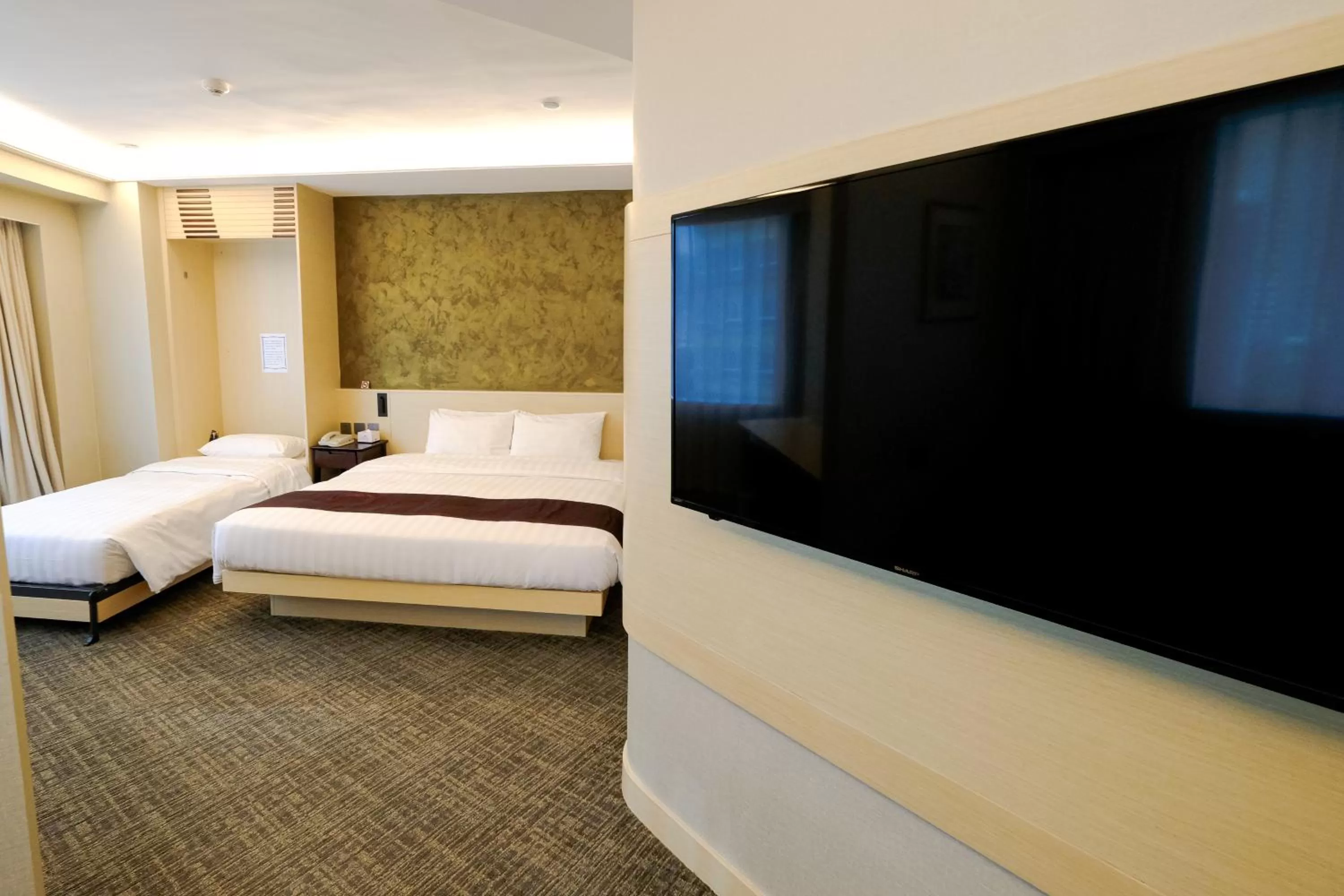 Bed in South Pacific Hotel