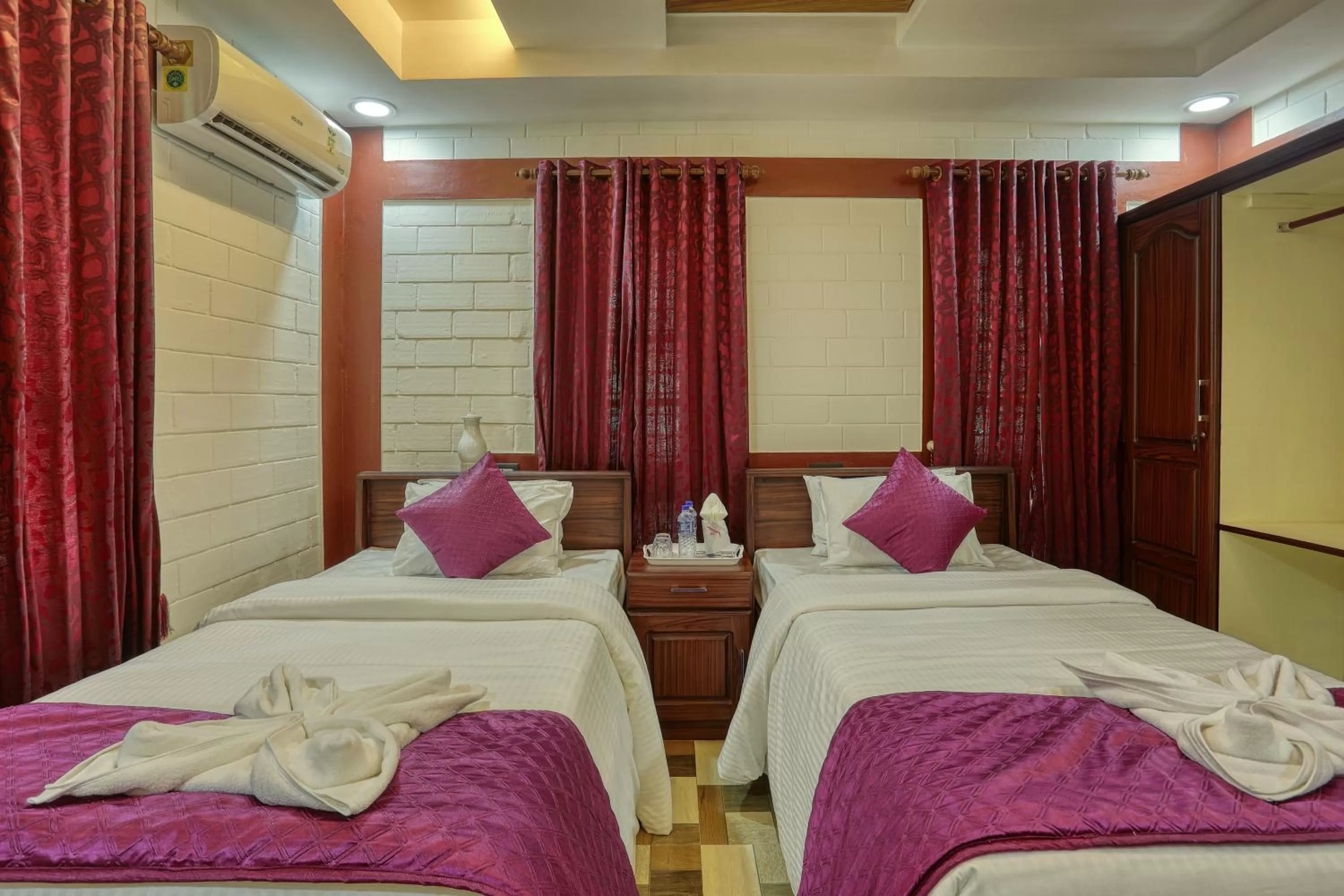Bed in LEISURE VALLEY BEACH RESORT