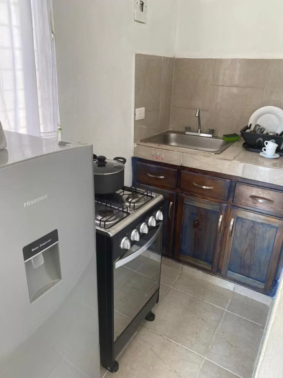 Kitchen/Kitchenette in Chao Mamá Hostal