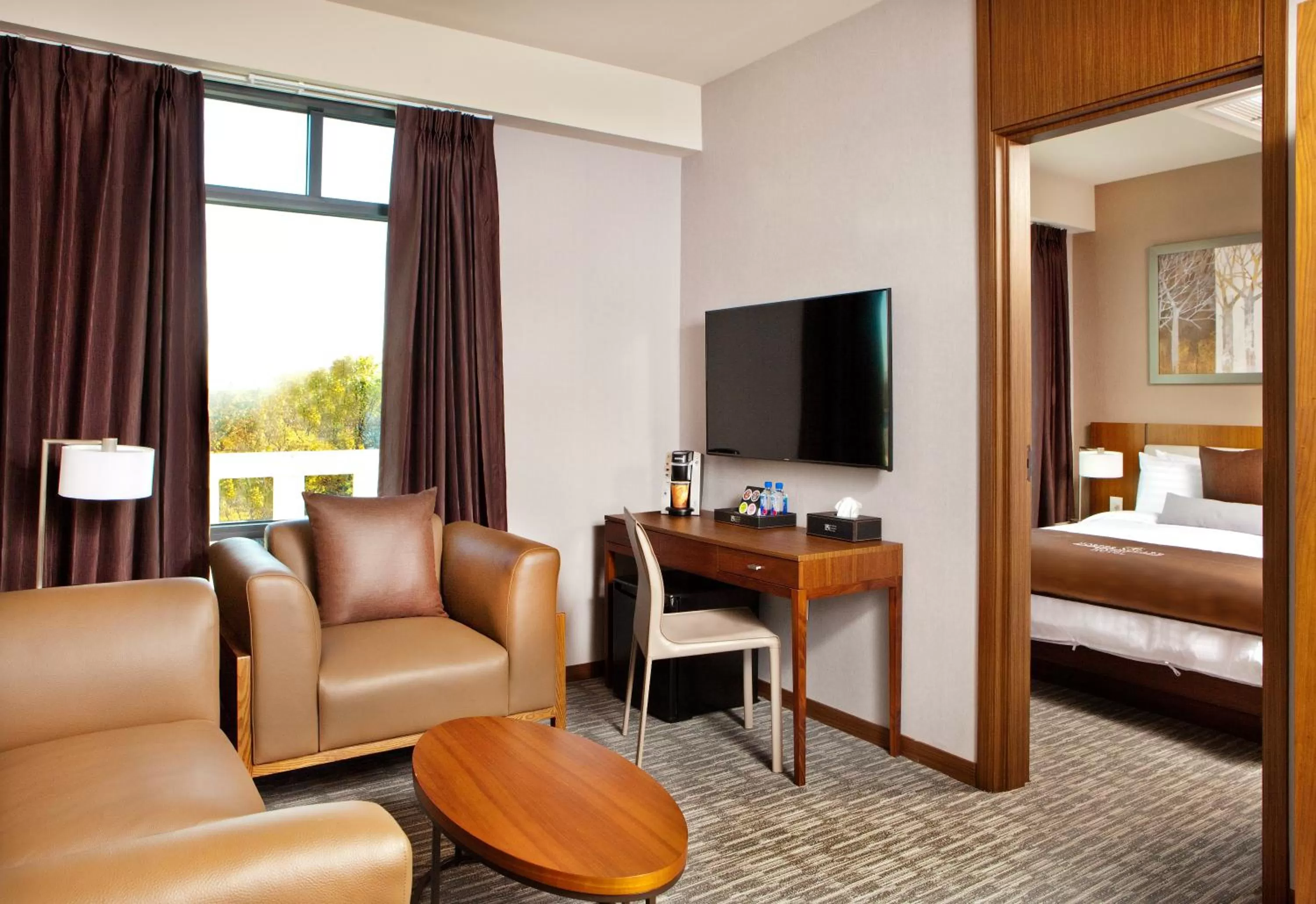 Seating area, Bed in Porter Square Hotel