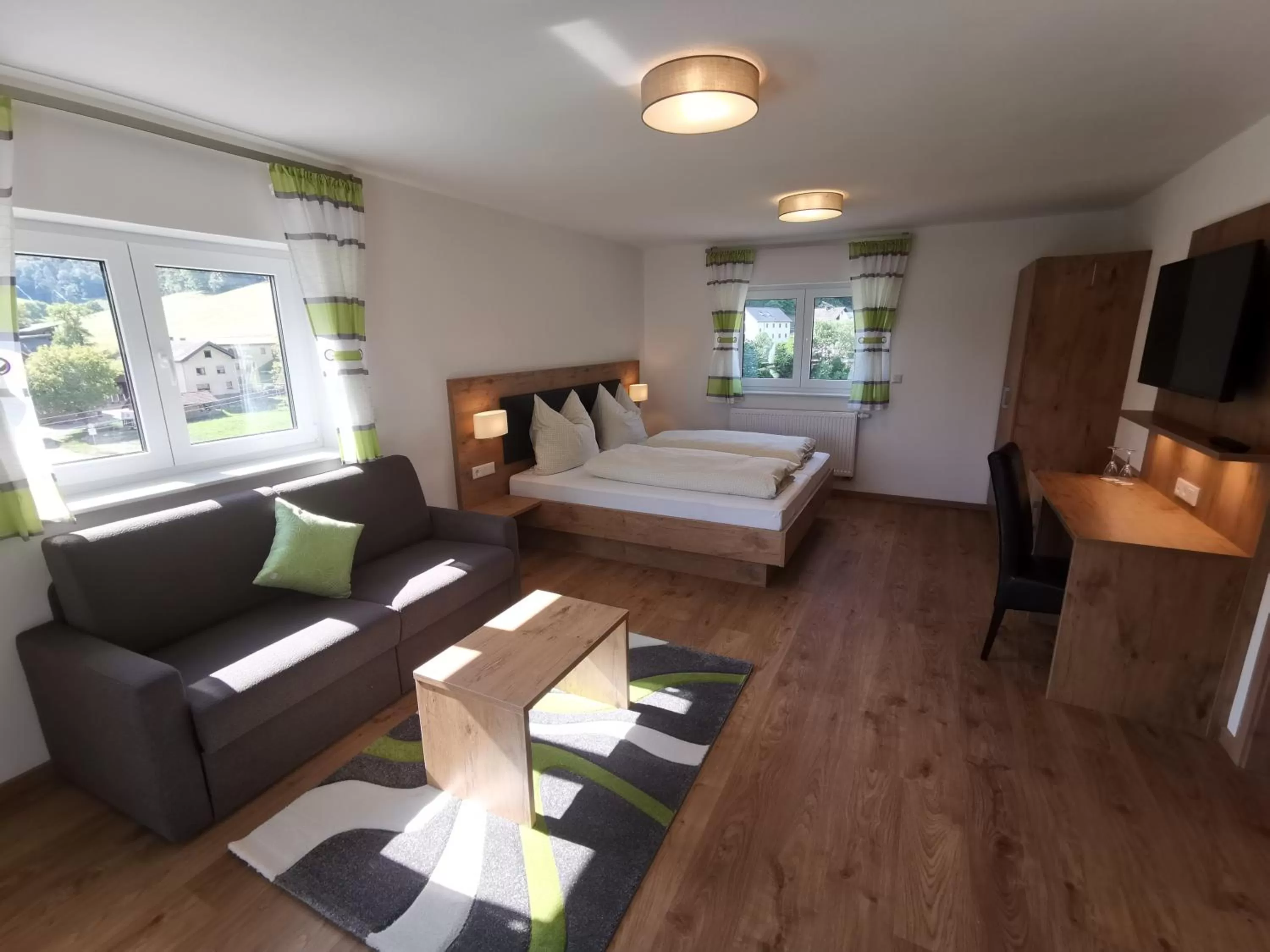 Photo of the whole room, Bed in Hotel Grüner Baum mit Restaurant & Wellness