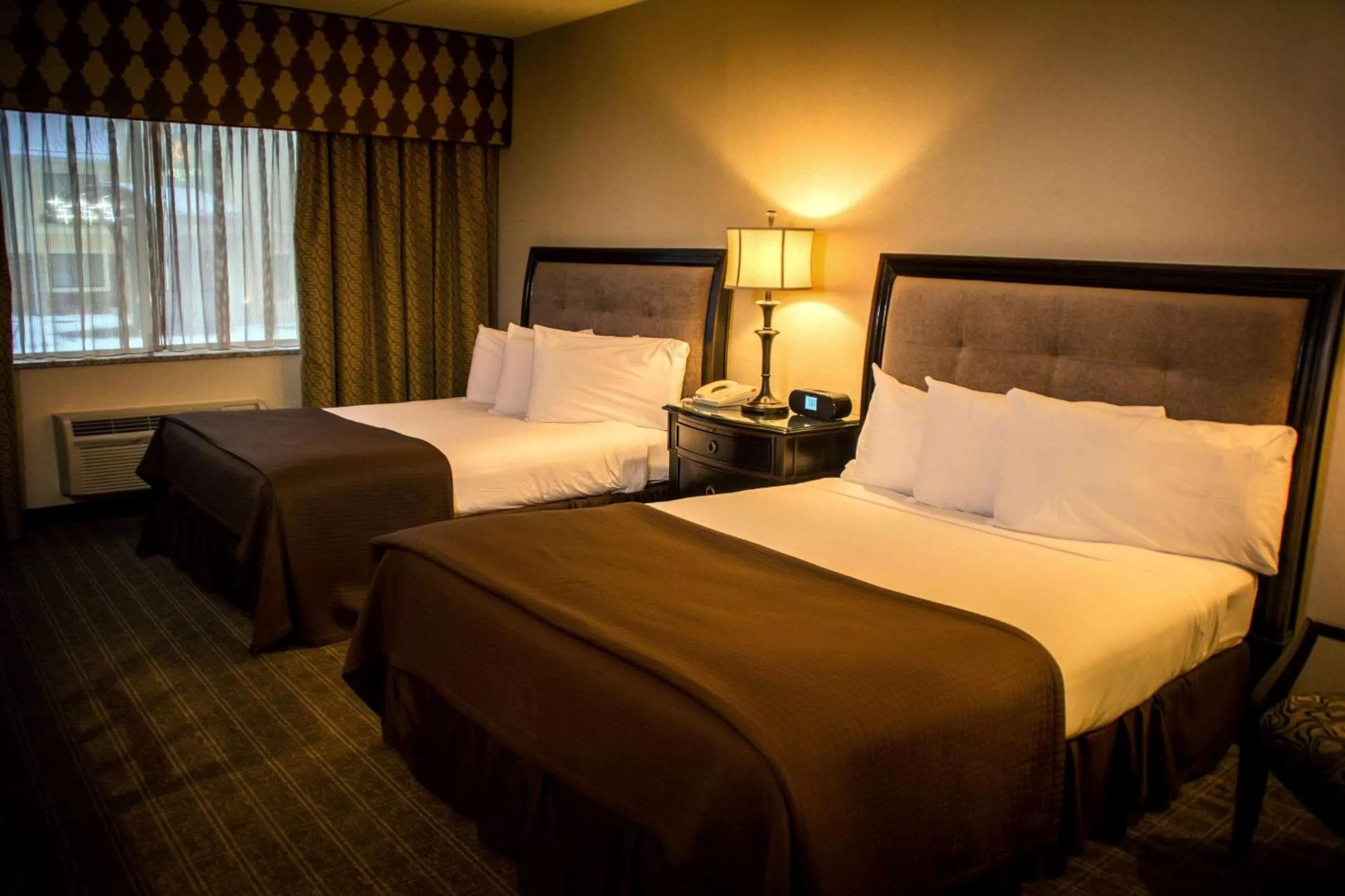 Photo of the whole room, Bed in Garden Place Hotel