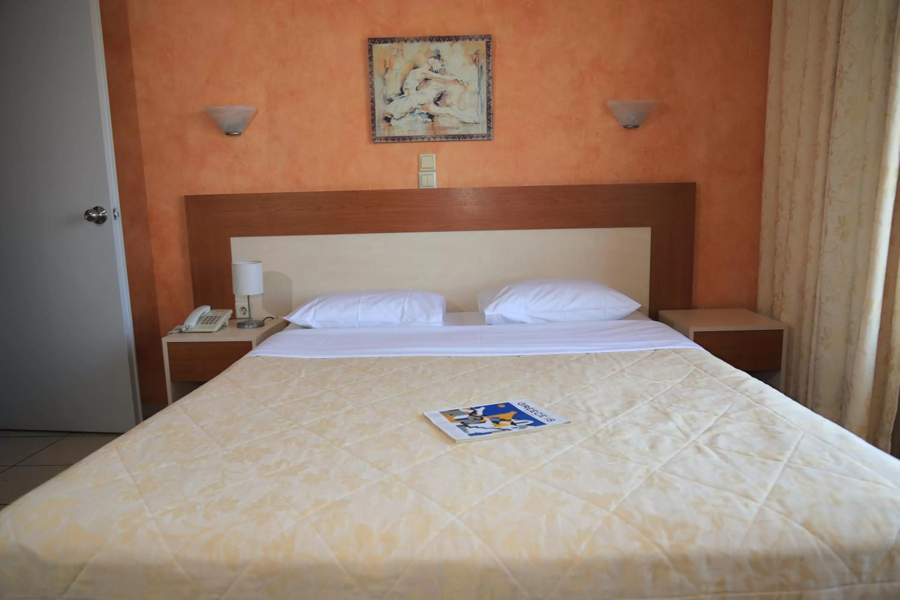 Bed in IKAROS Hotel ELLINIKO