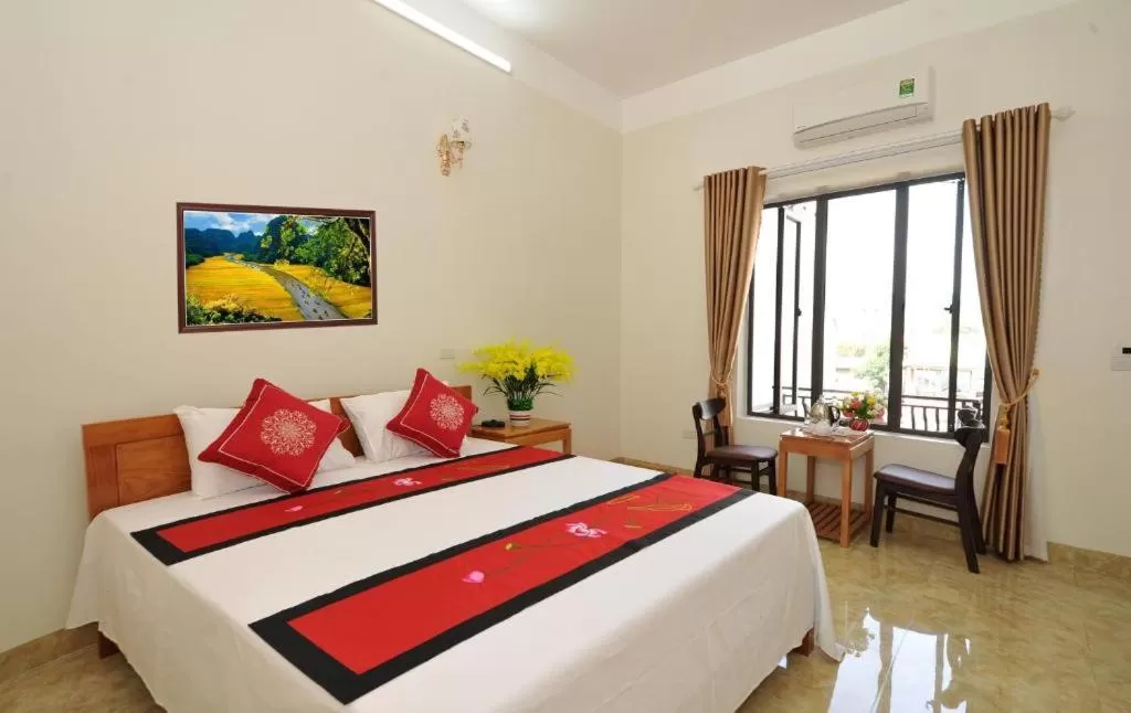 Deluxe Double Room (2 Adults + 1 Child) in TAMCOC VUTHANH FRIENDLY Hotel