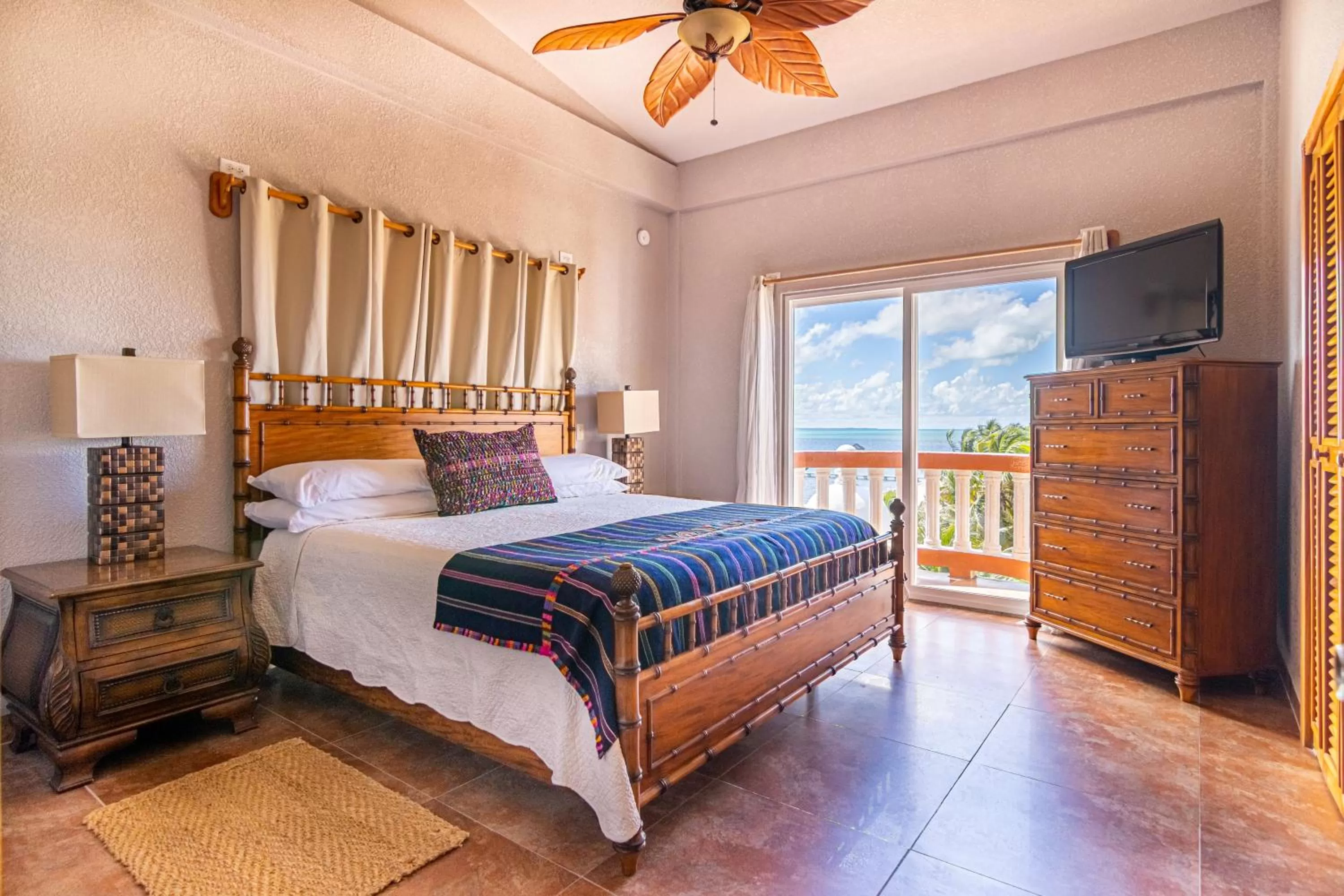 Bed in Lighthouse Beach Villas