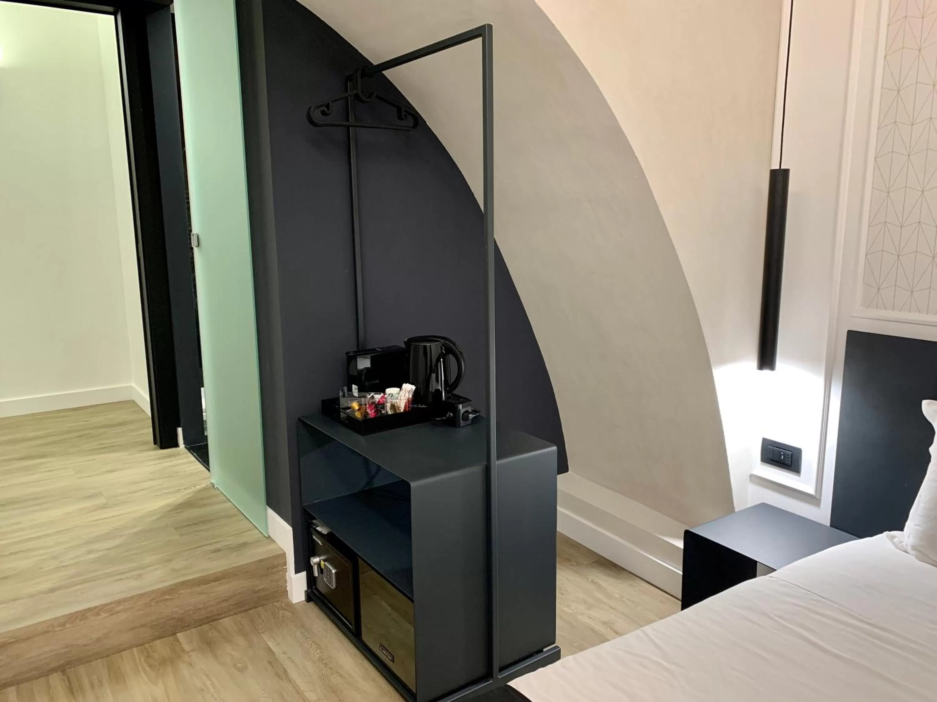 Bedroom, TV/Entertainment Center in Toledo Boutique Rooms