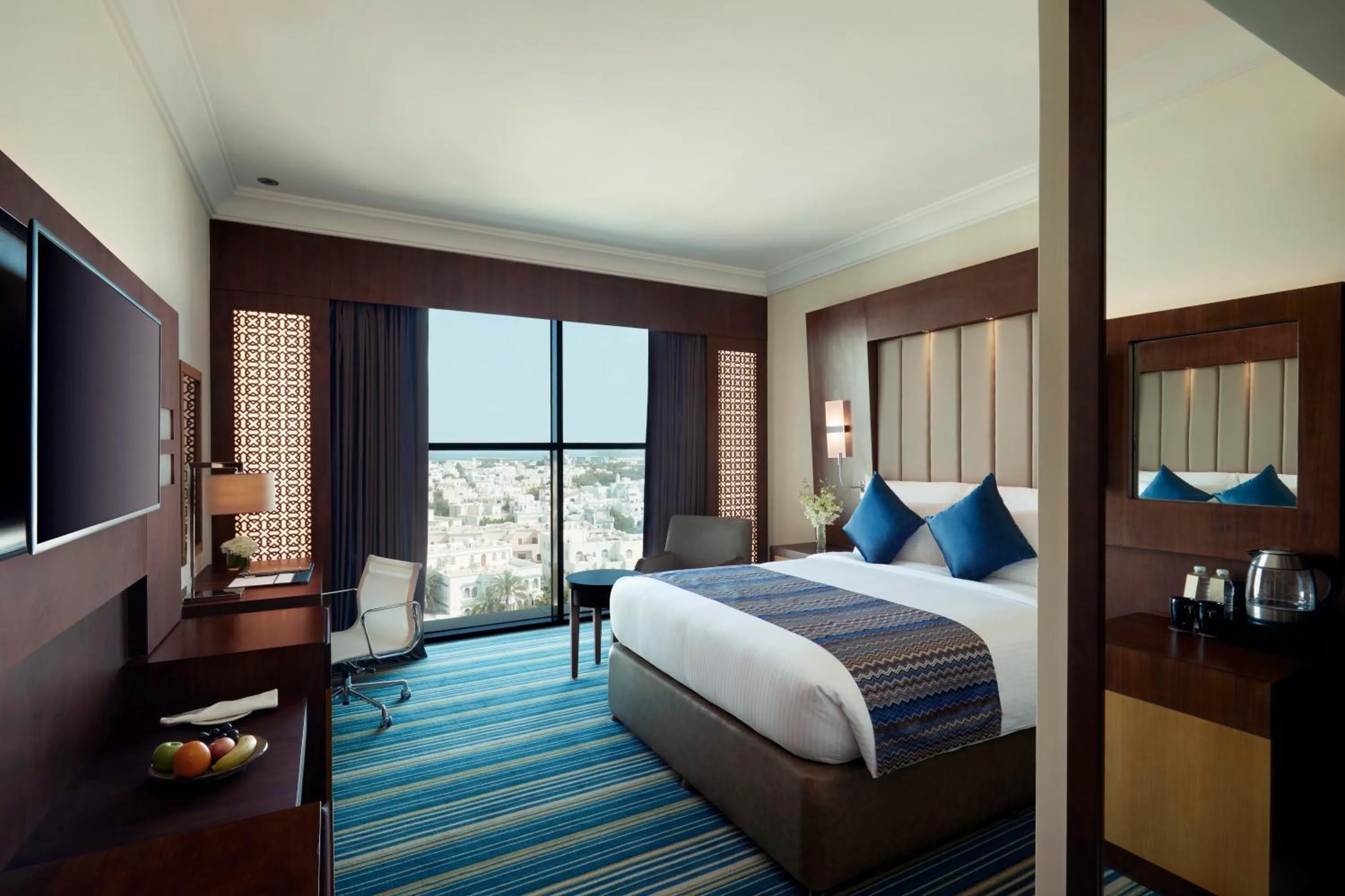 Photo of the whole room, Bed in Royal Tulip Muscat