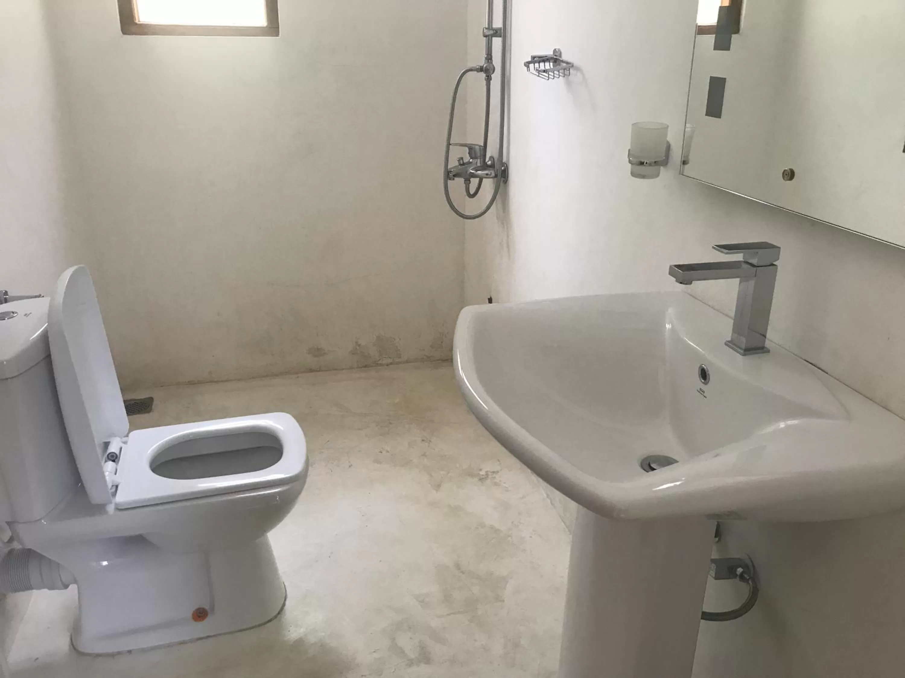 Bathroom in Raveena Guest House