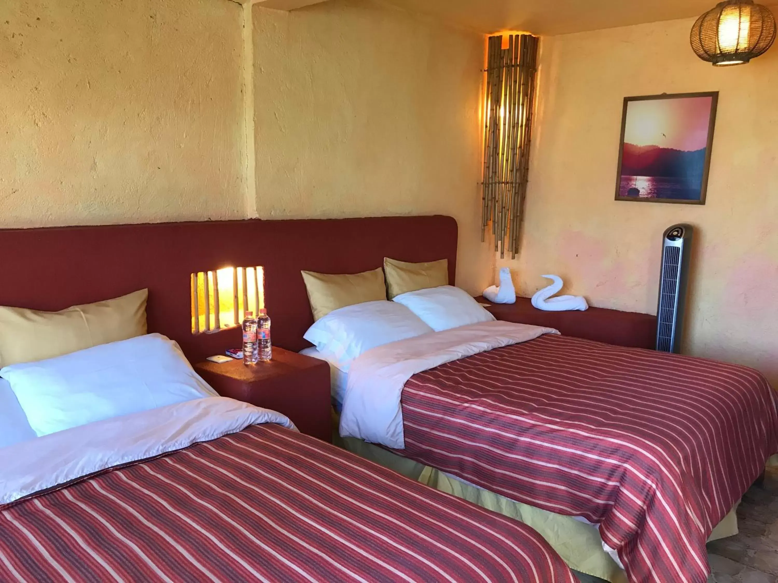 Quadruple Room with Lake View in Hotel puesta del sol Quadruple Room with Lake View in Hotel puesta del sol