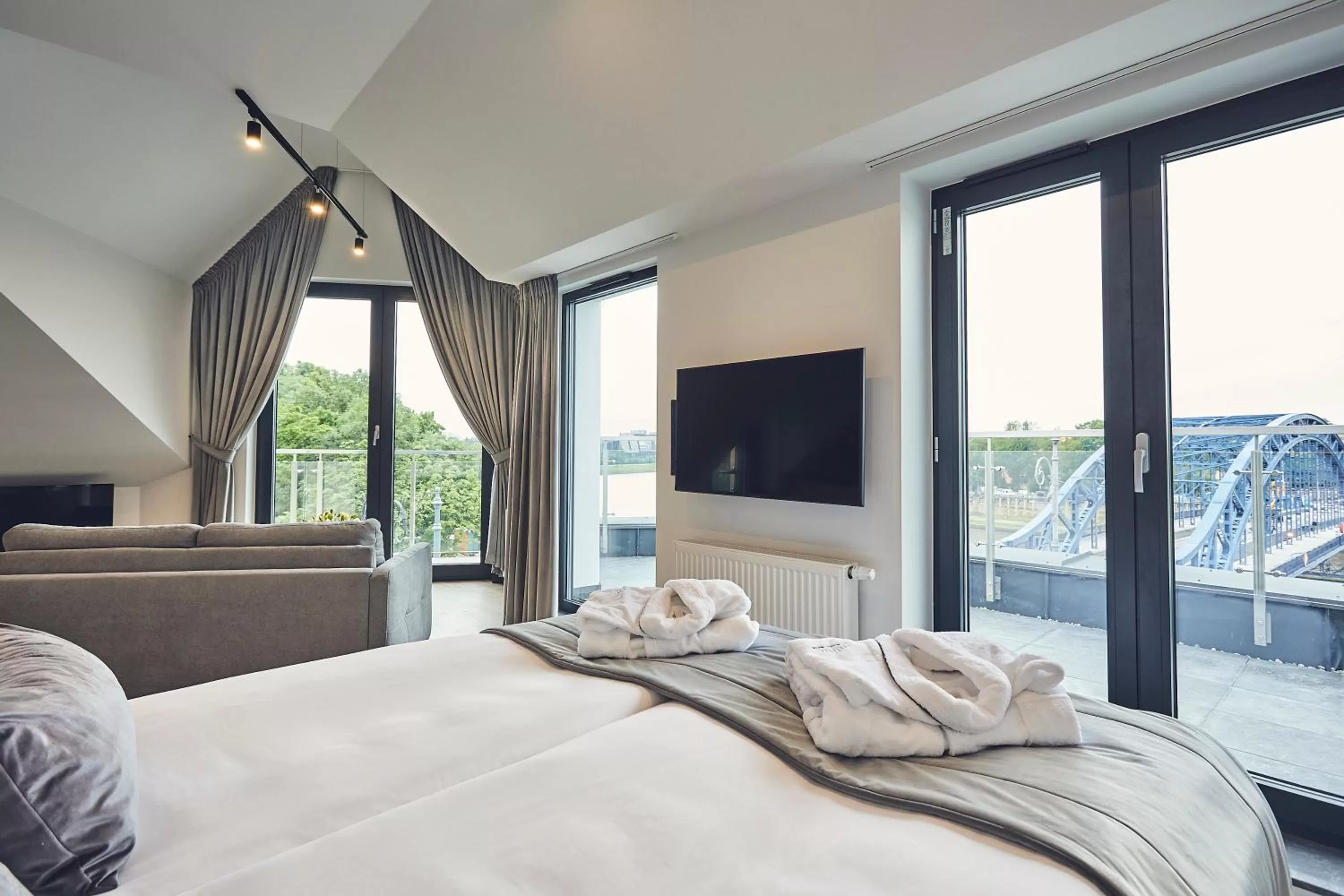 Photo of the whole room, Bed in The Bridge Suites Hotel