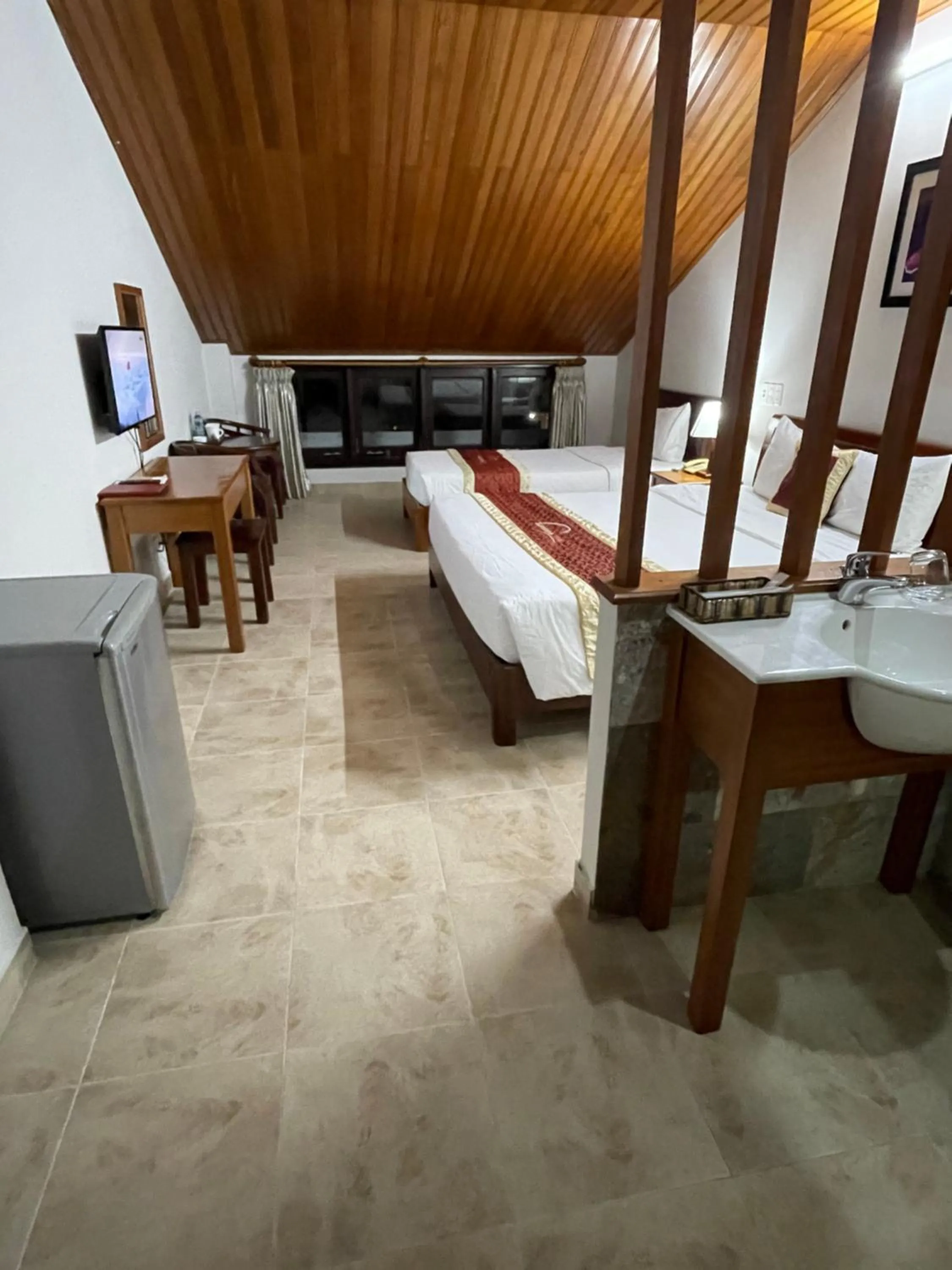 Bed in Sunshine Hoian Hotel