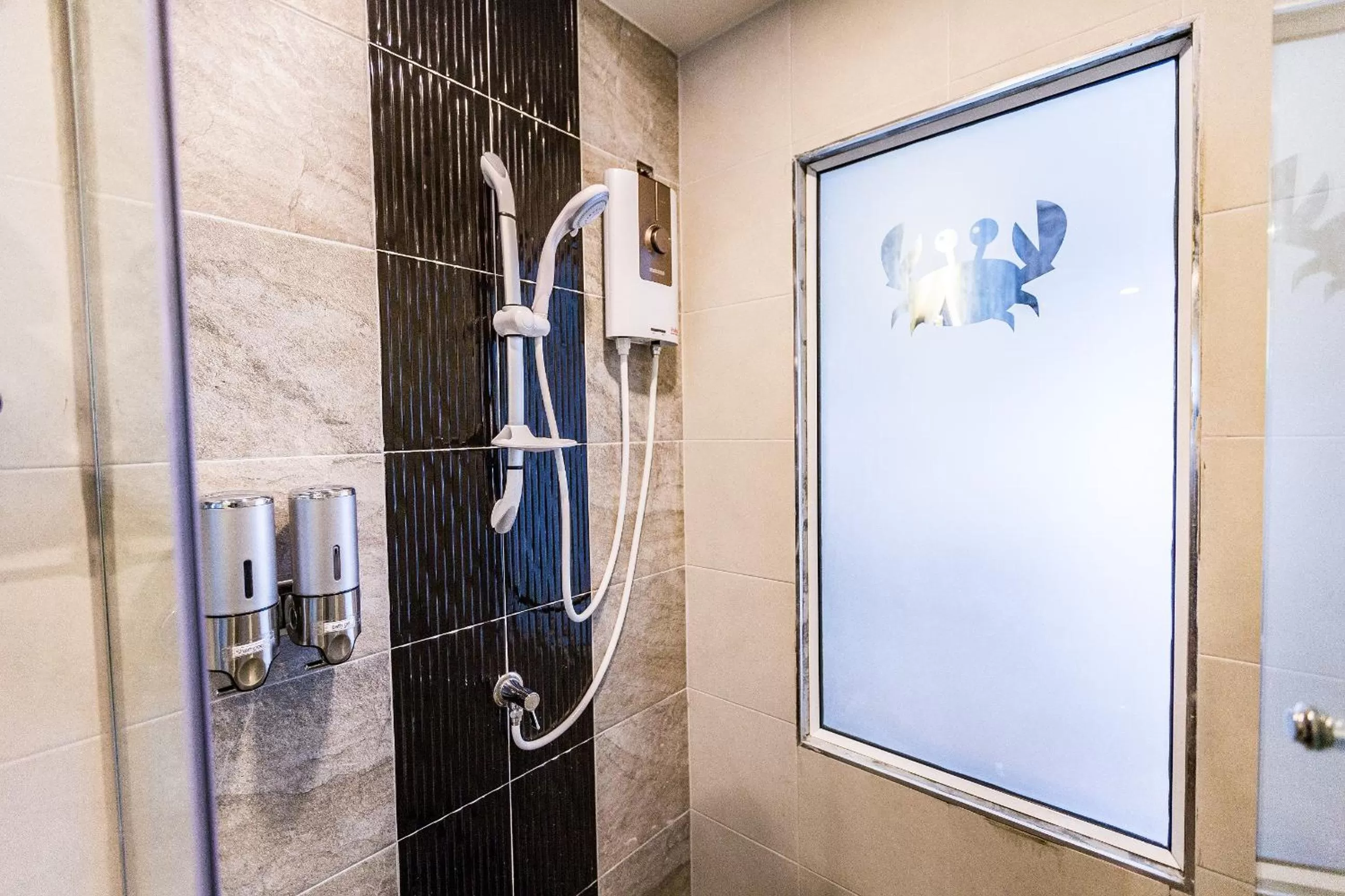 Shower in Maneetel Krabi Beachfront-SHA Plus