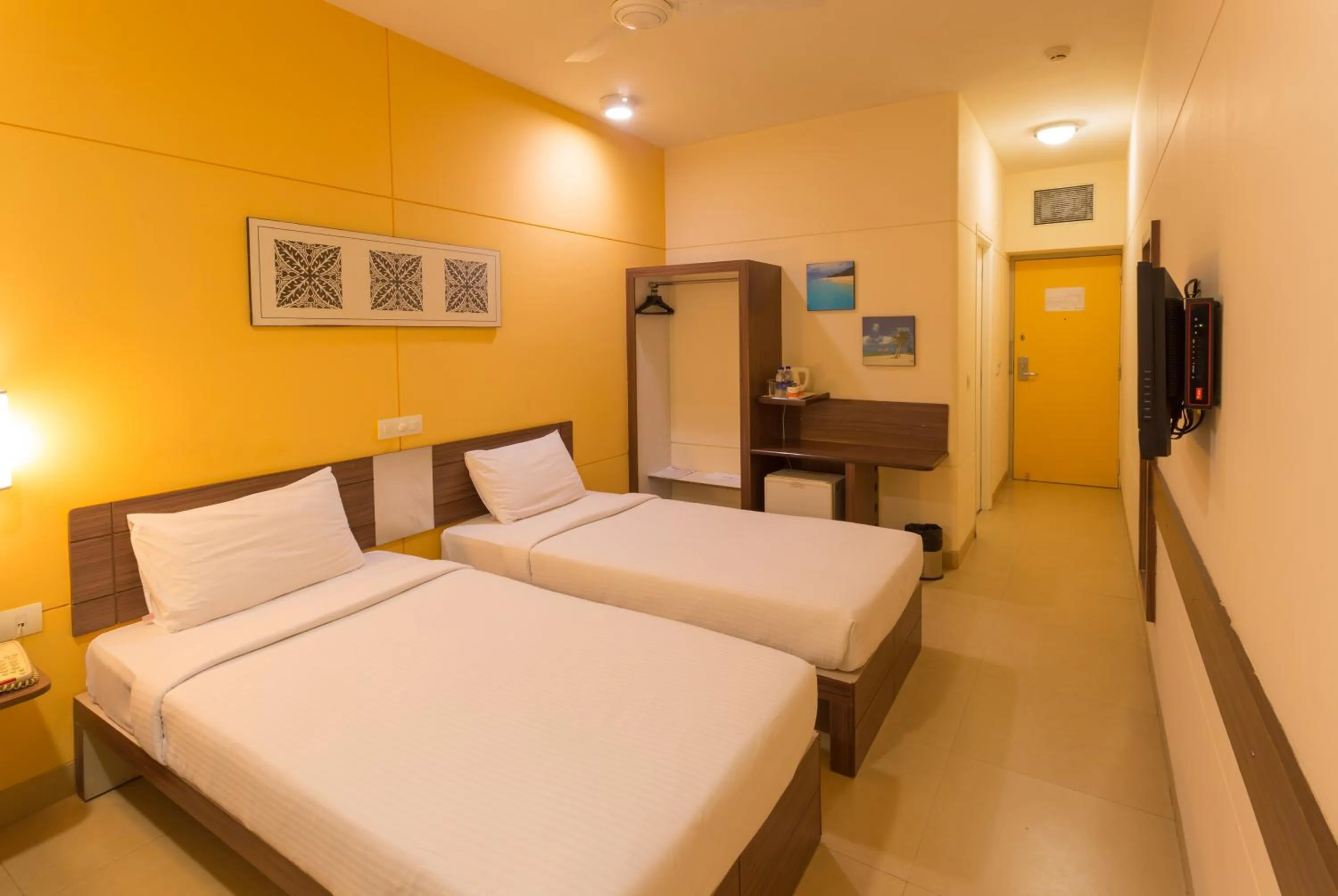 Photo of the whole room, Bed in Ginger Mangalore