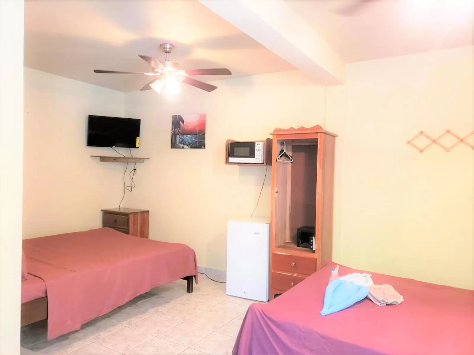 Bed in Beach Side Condos Caye Caulker by CCVH