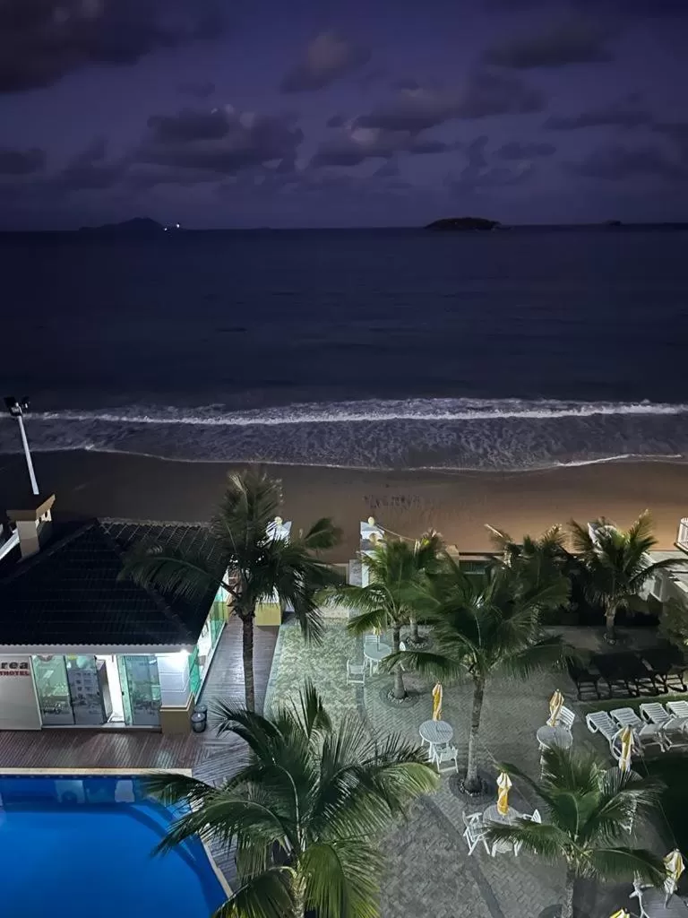 Night, Pool View in Golfinhos Apart Hotel