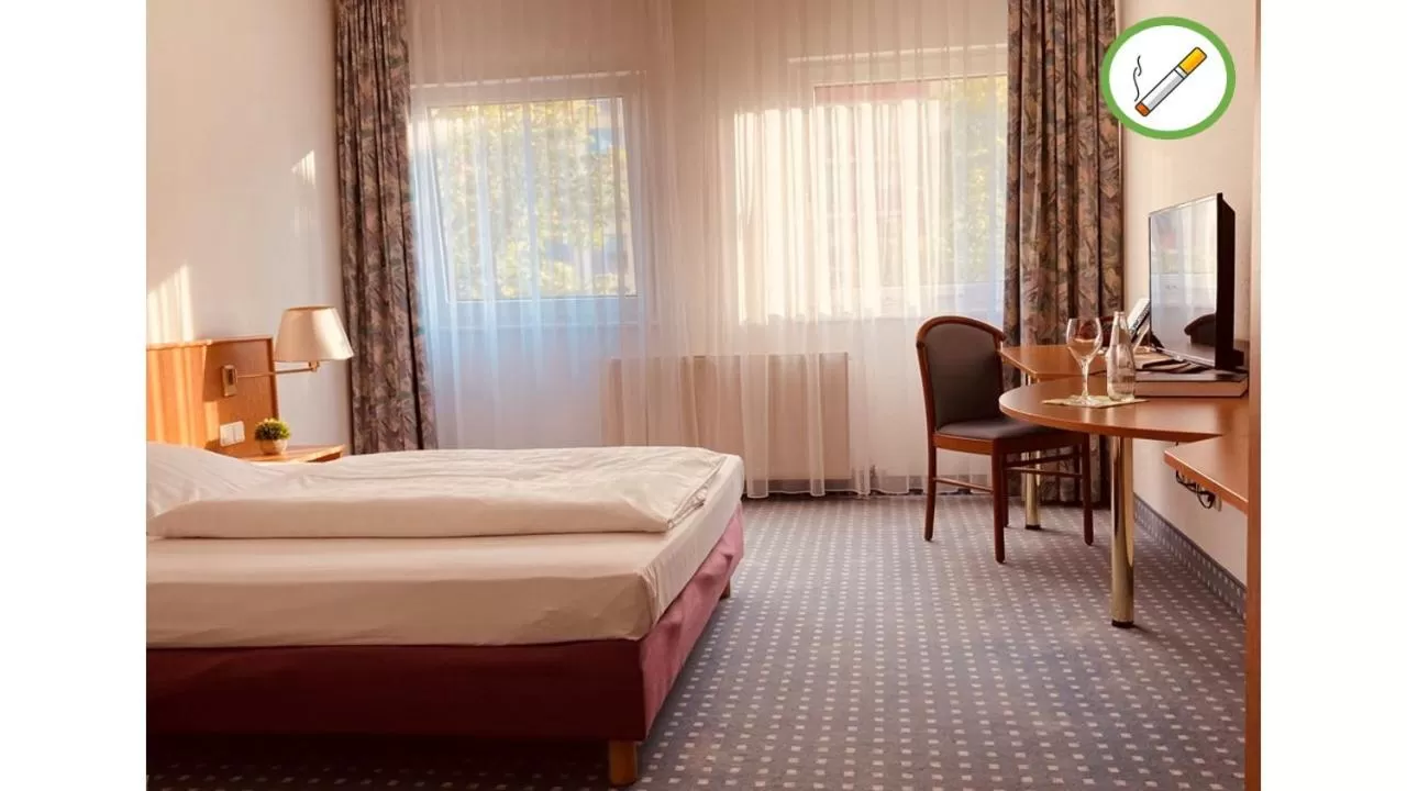 Photo of the whole room, Bed in Akzent Congresshotel Hoyerswerda