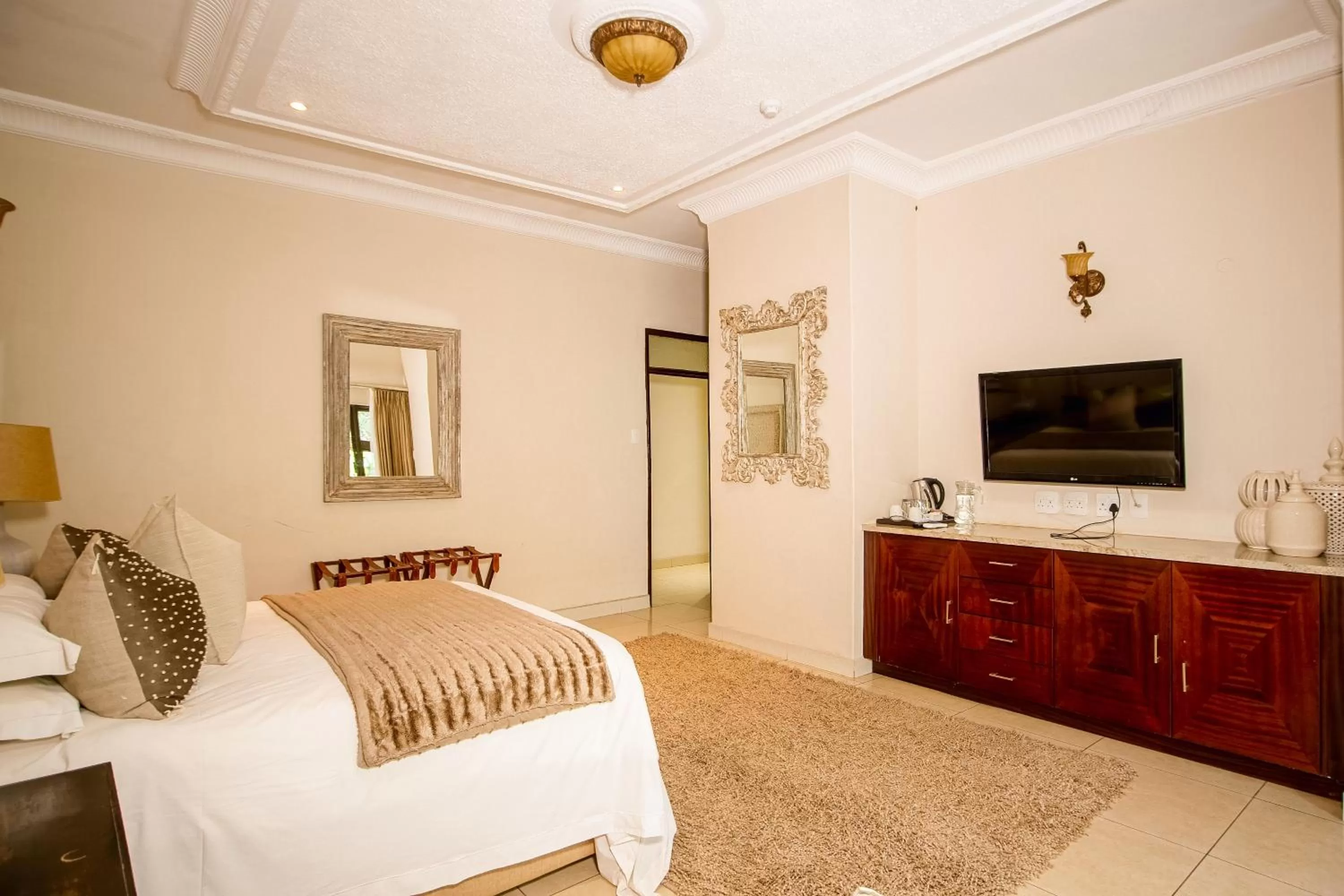 Photo of the whole room, Bed in The Victoria Falls Deluxe Suites