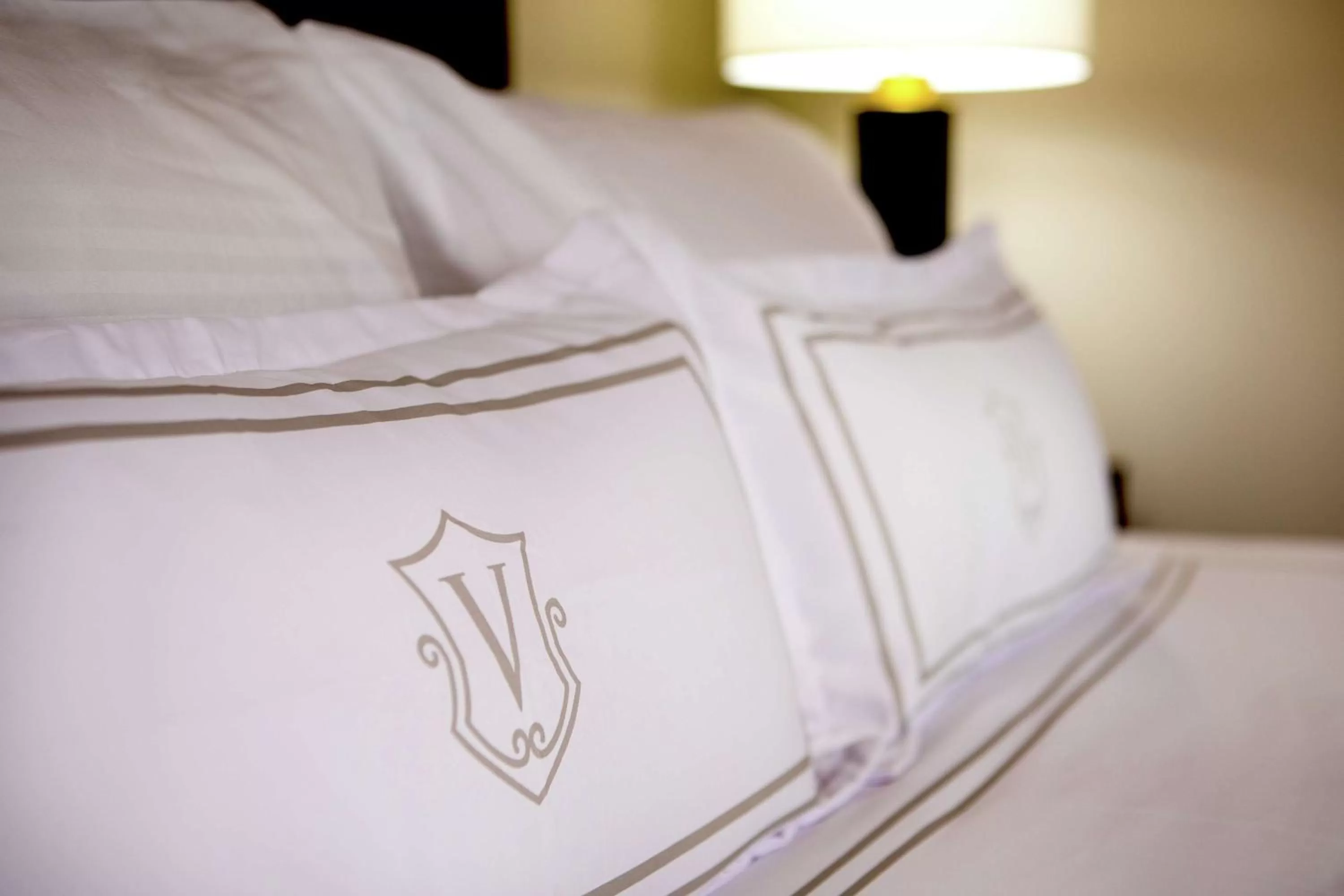 Bed in The Virginian Lynchburg, Curio Collection By Hilton