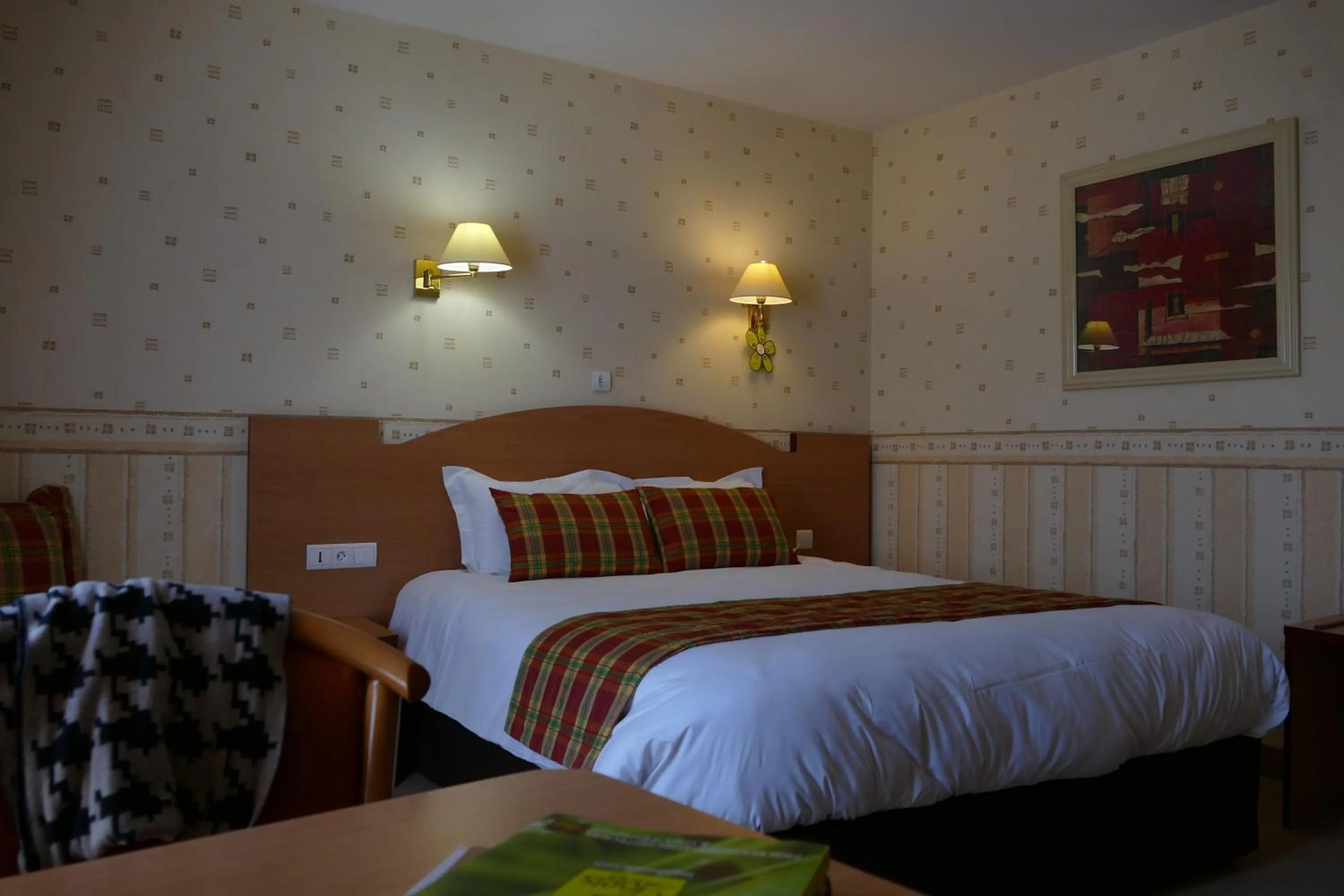 Bed in Logis Hotels Le Champalud Restaurant La Citadelle