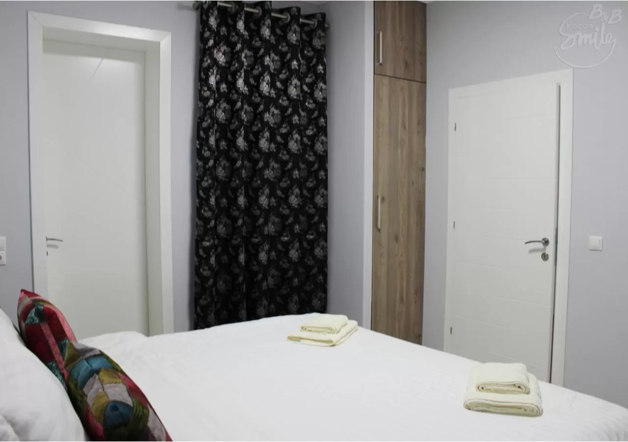 Bed in KorcaSmileHotel