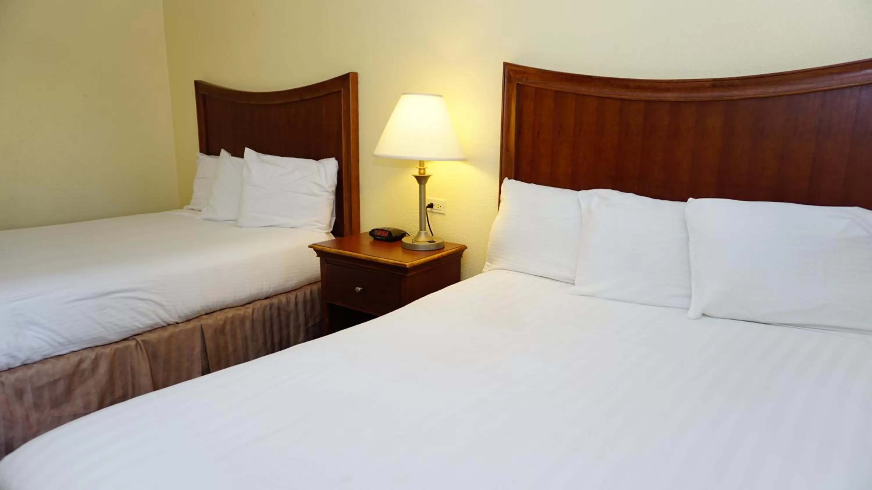 Decorative detail, Bed in Baymont by Wyndham Arlington At Six Flags Dr