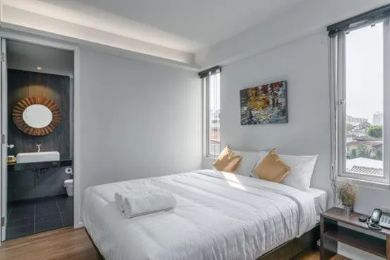 Bed in Kitzio House Hotel Huai Kwang