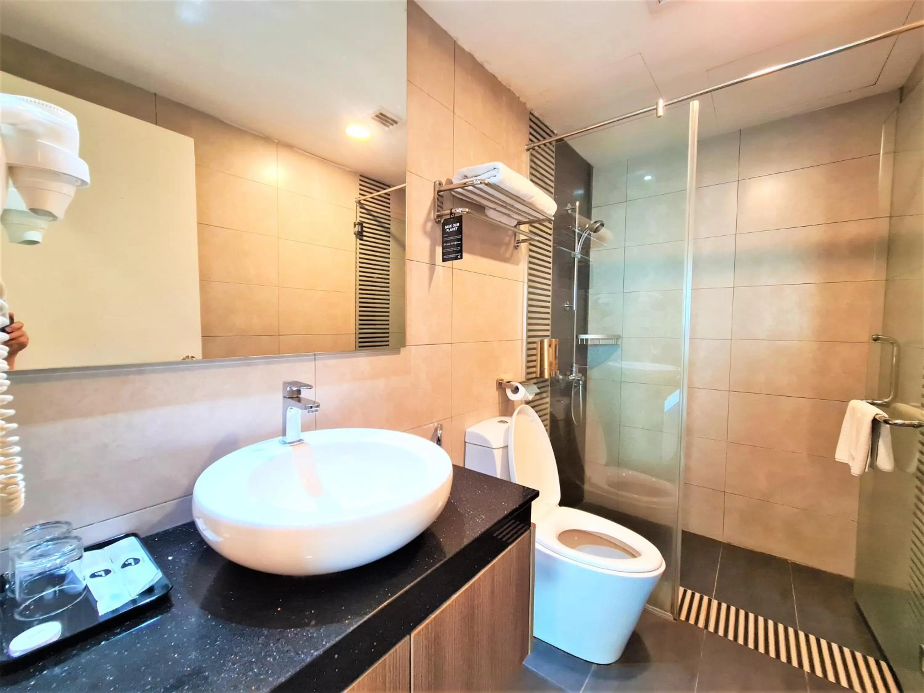 Shower in Nexus Regency Suites & Hotel