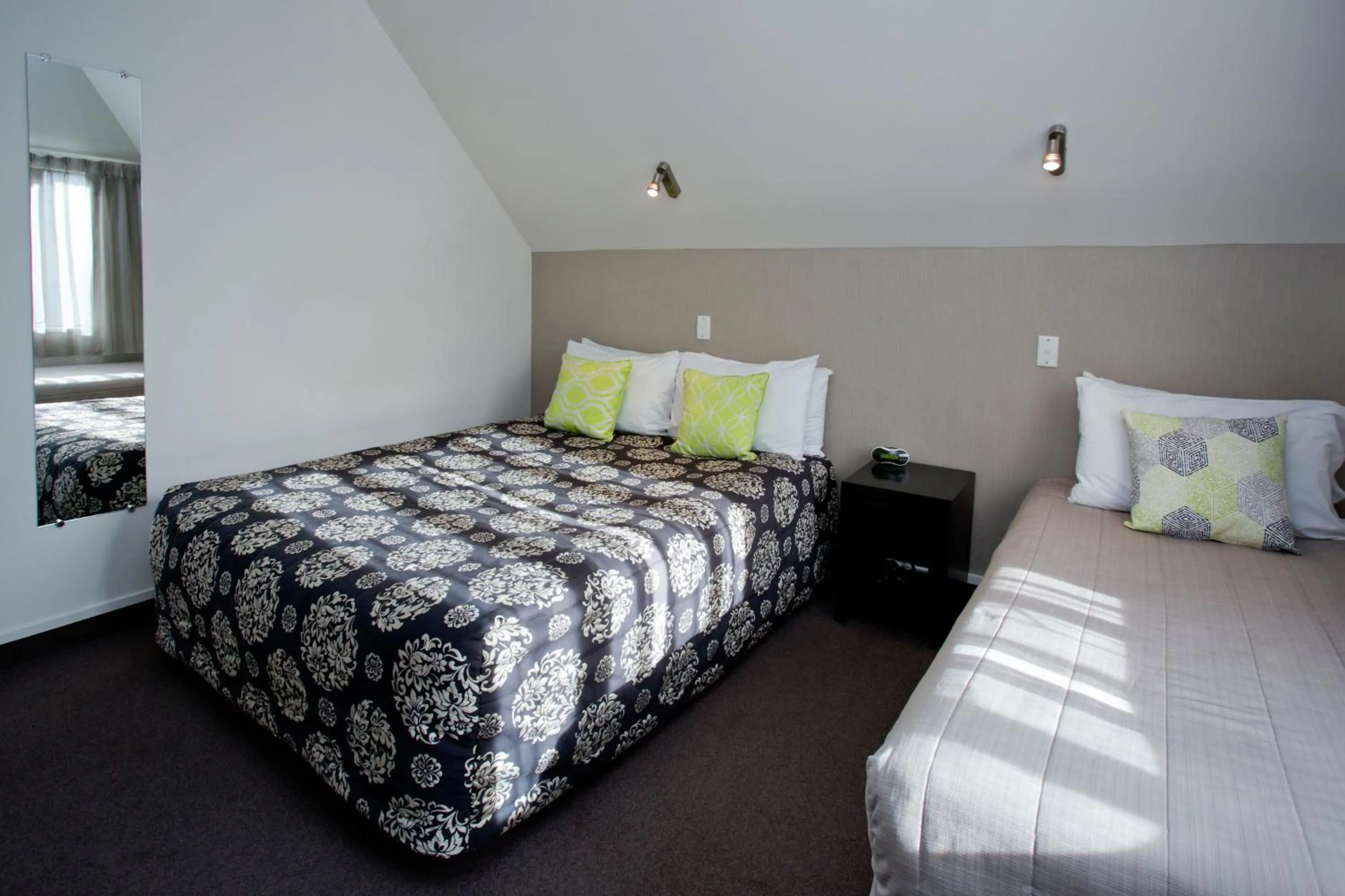 Bed in Cable Court Motel