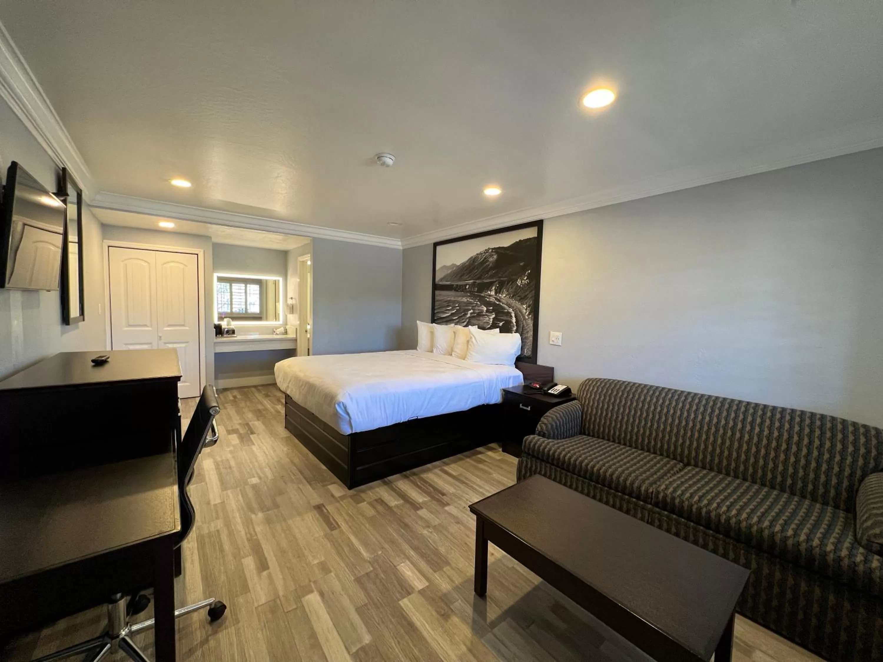 Bed in Aura Inn Monterey