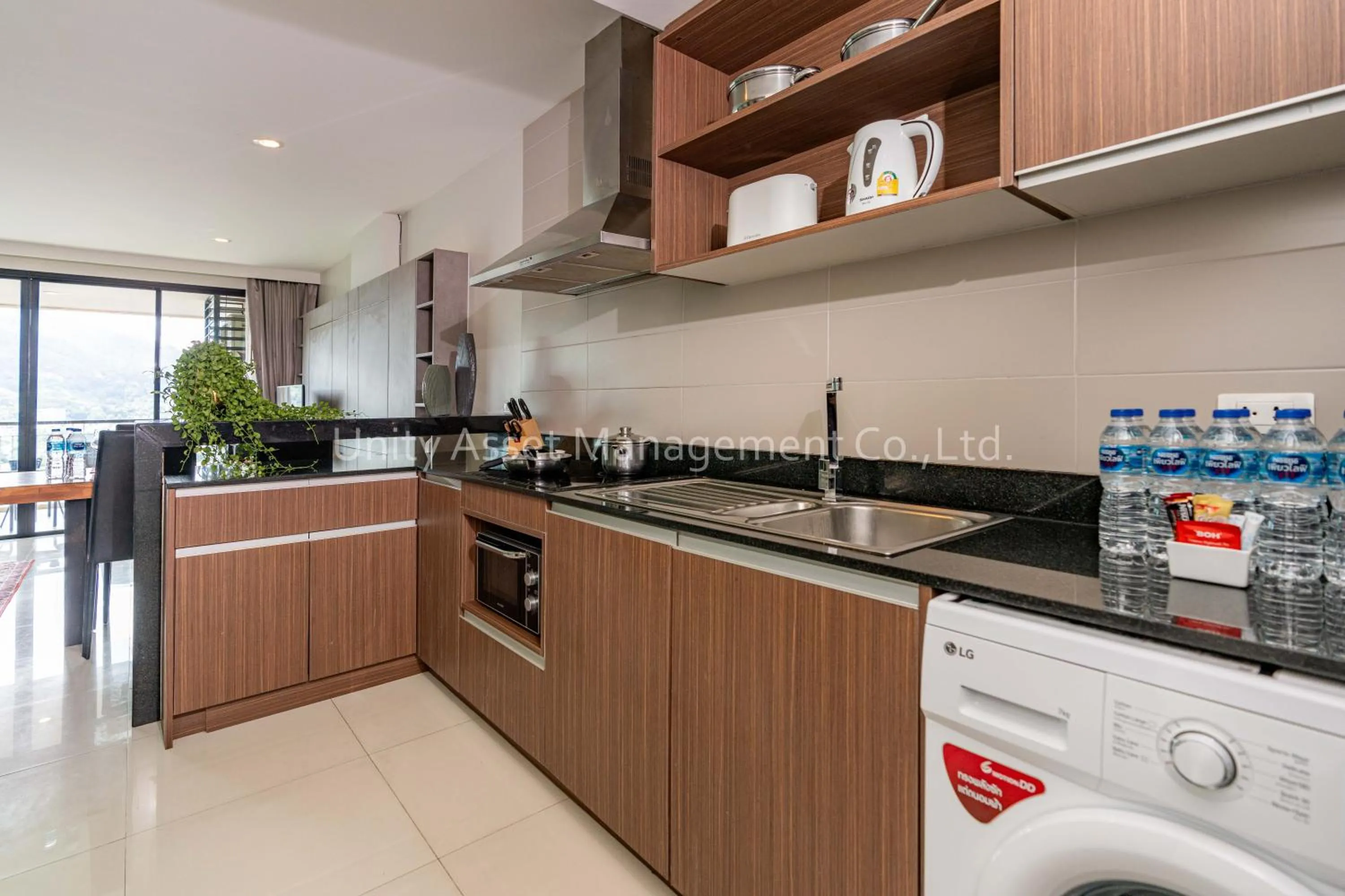 Kitchen or kitchenette in The Unity and The Bliss Patong Residence