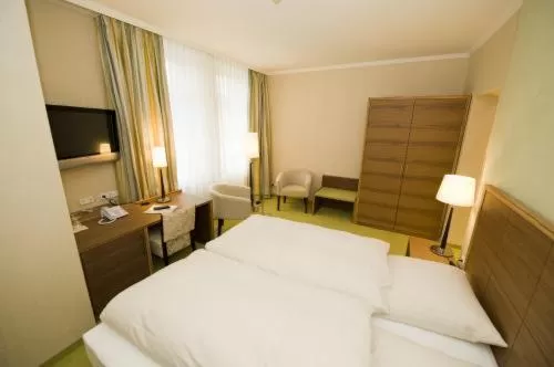 Bed in Gästehaus Heinrich Schüchtermann