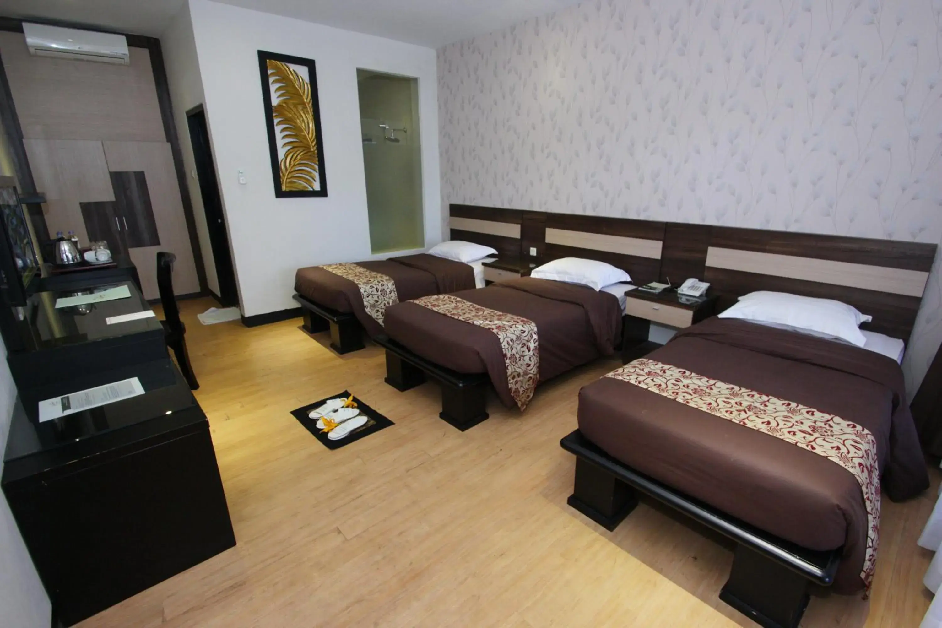 Superior Triple with Twin Bed in Kusuma Agrowisata Resort & Convention Superior Triple with Twin Bed in Kusuma Agrowisata Resort & Convention