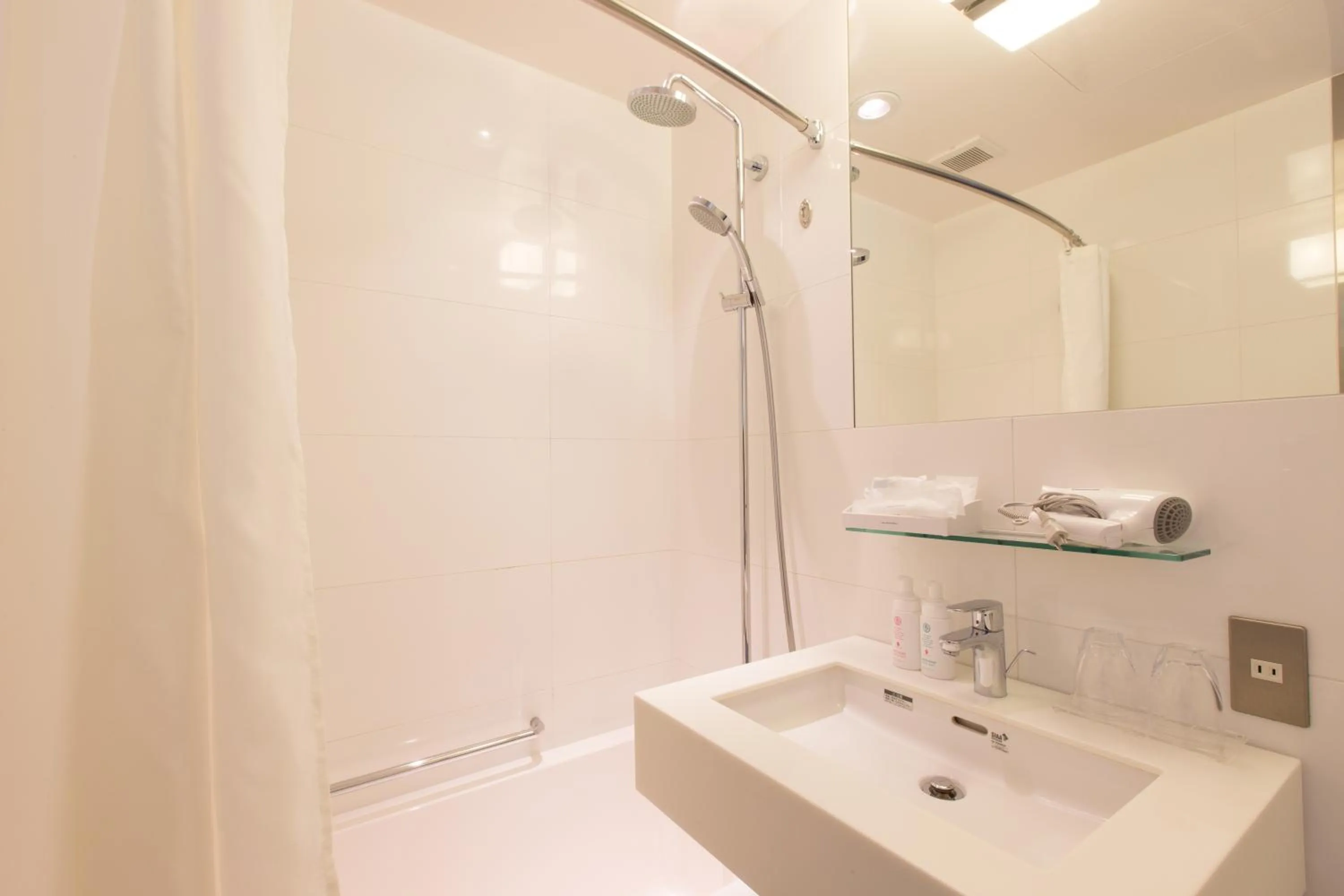 Bathroom in The Gate Hotel Kaminarimon by Hulic