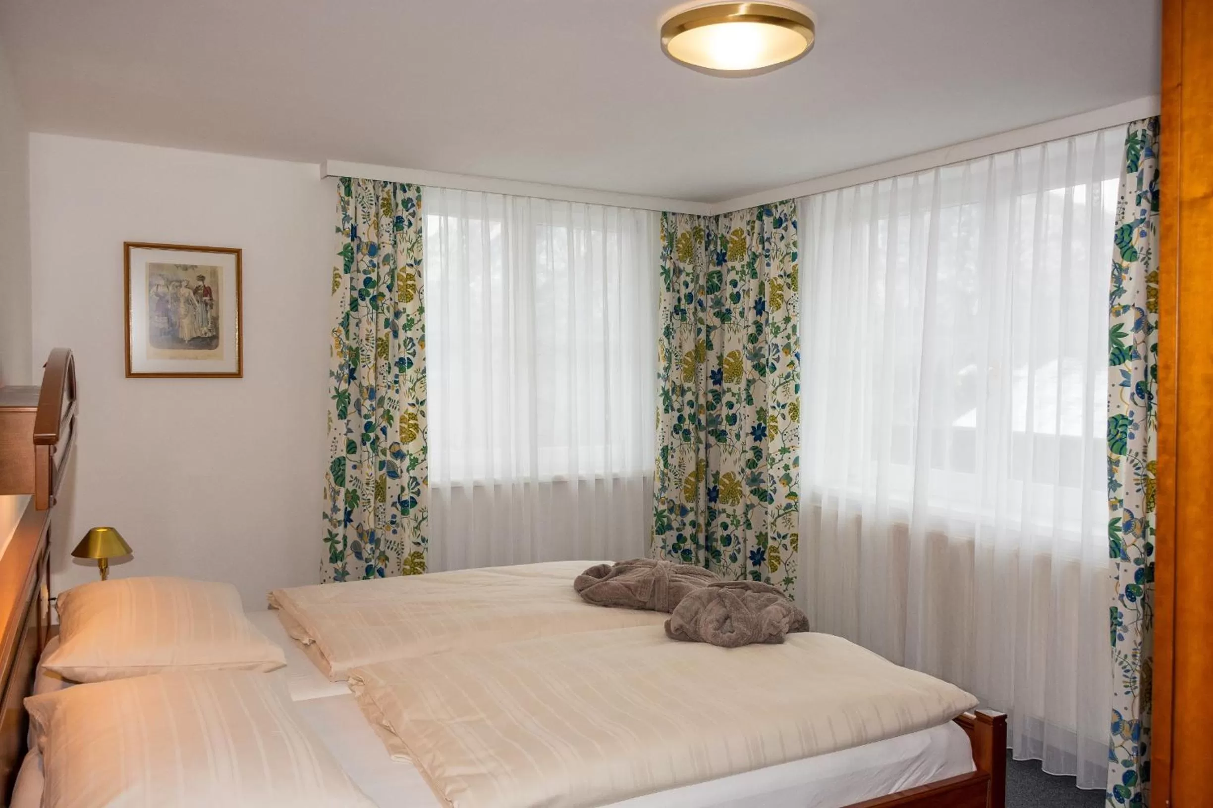 Photo of the whole room, Bed in Landhotel Post Ebensee am Traunsee ***S