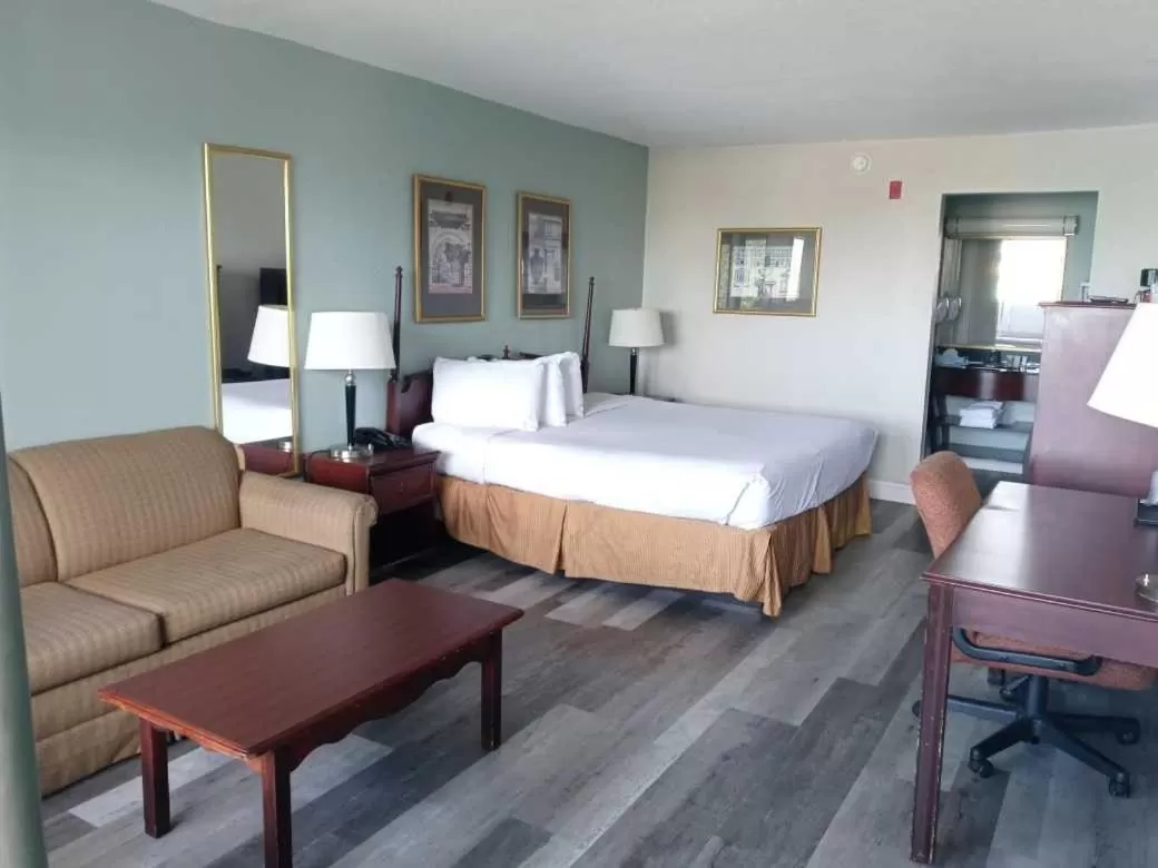 Bed in Opal Hotel & Suites