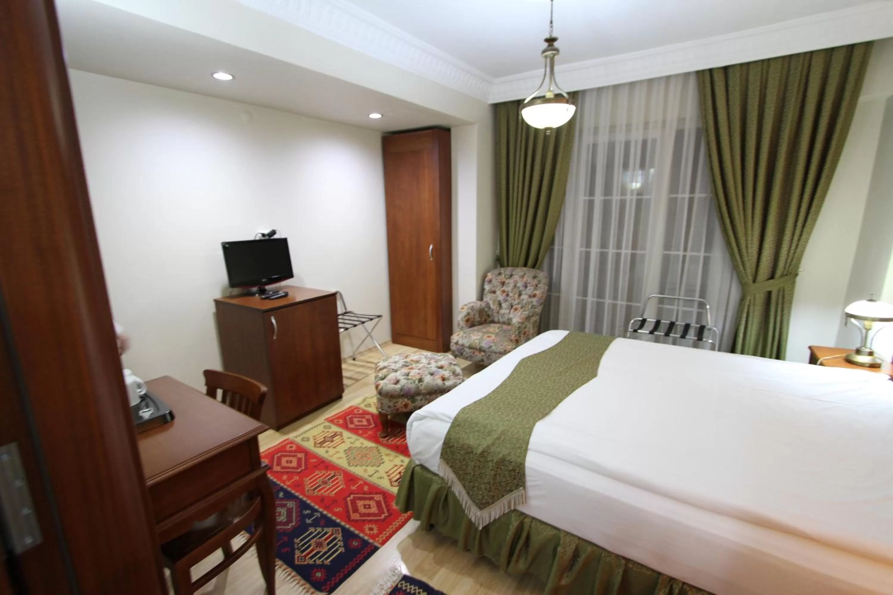 Bed in Basileus Hotel