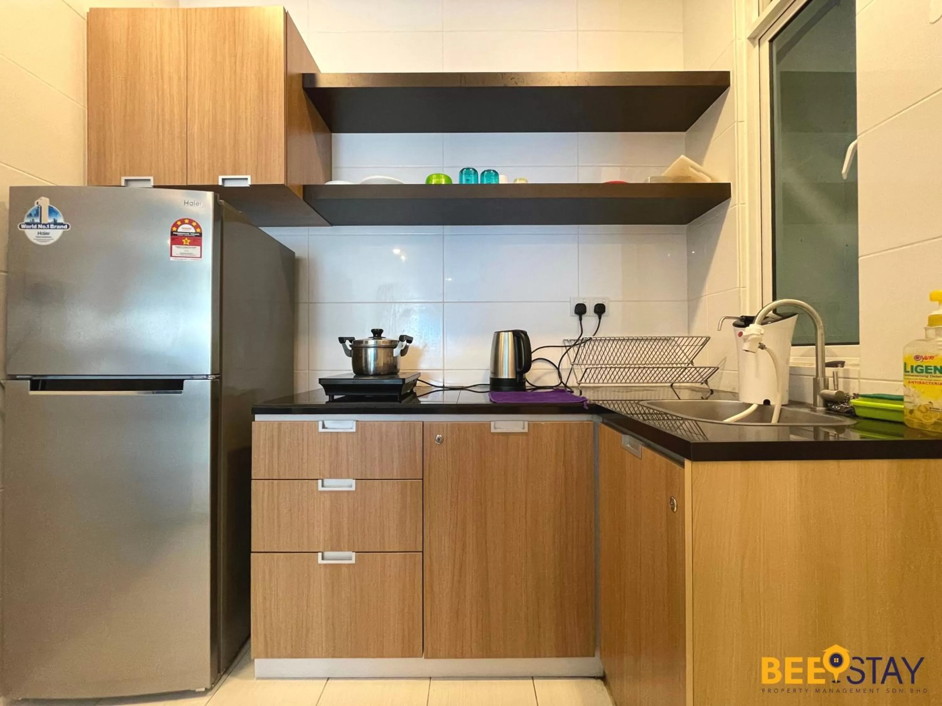 Kitchen/Kitchenette in The Wave Suites Melaka by BEESTAY