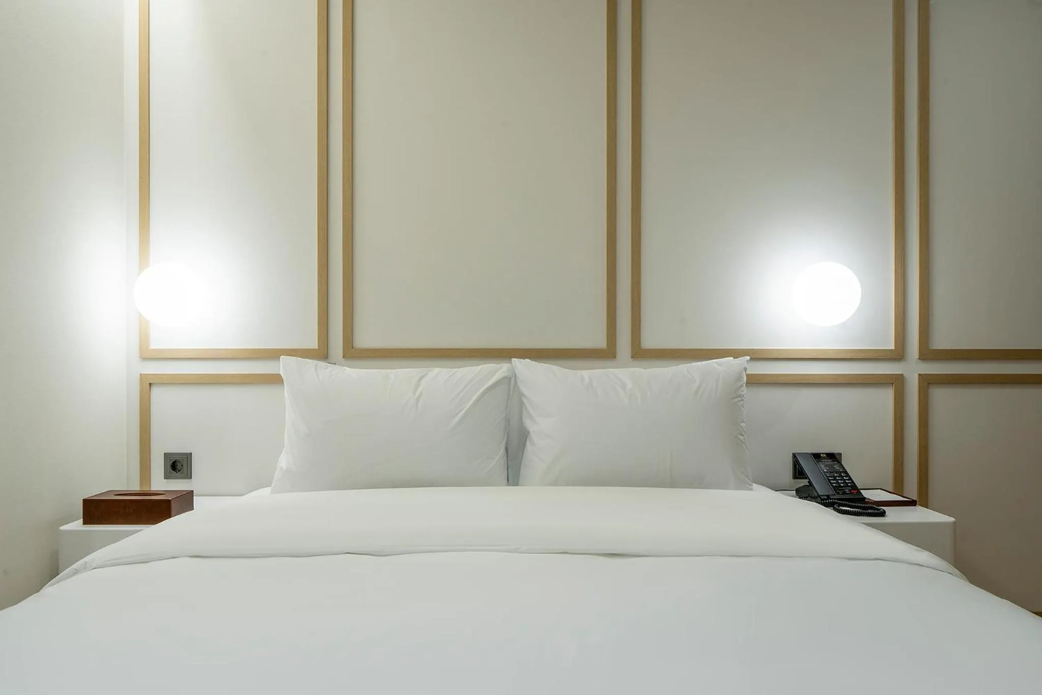 Bed in Jjak Boutique Hotel