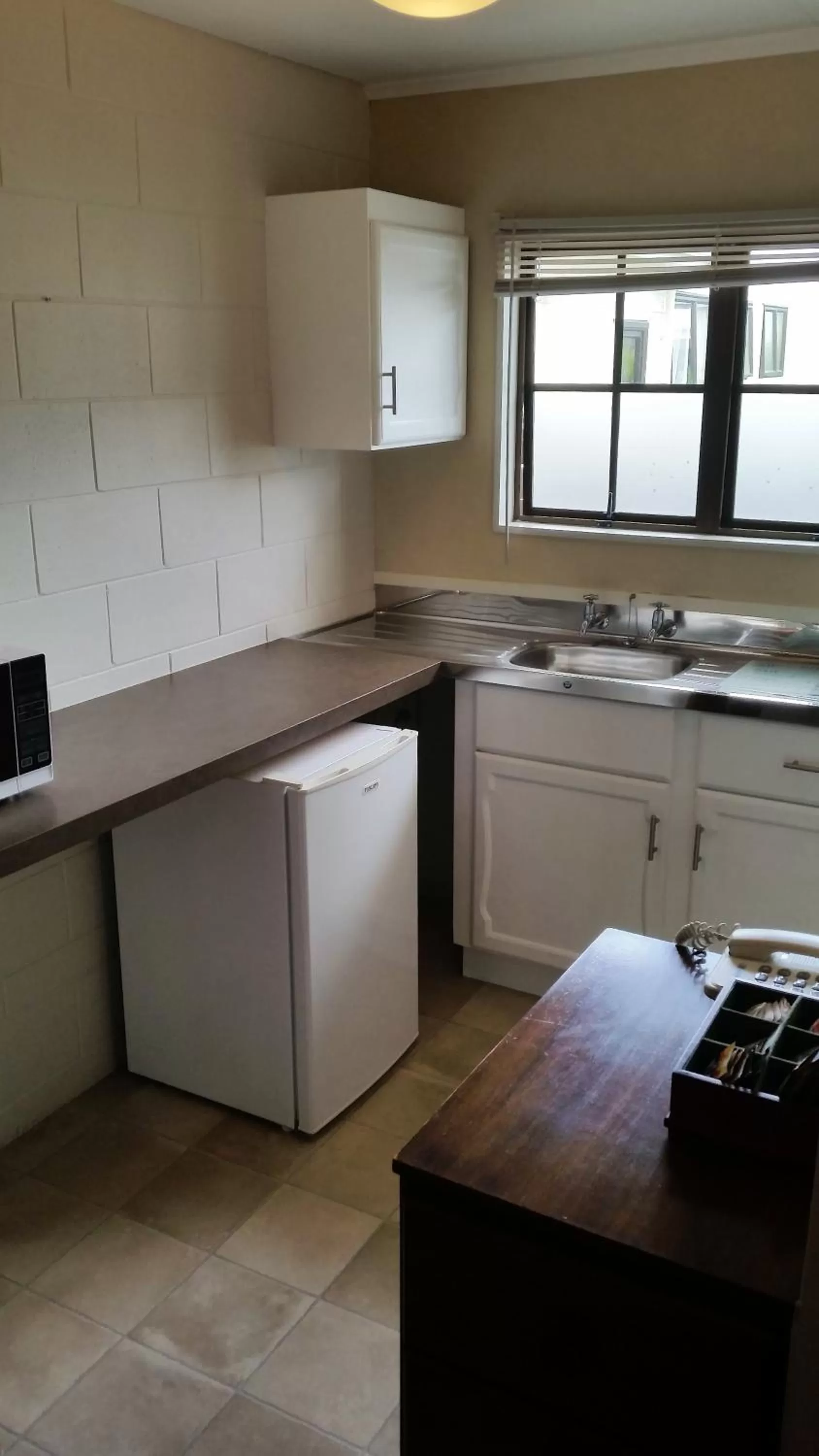 Kitchen or kitchenette in Stonehaven Motel