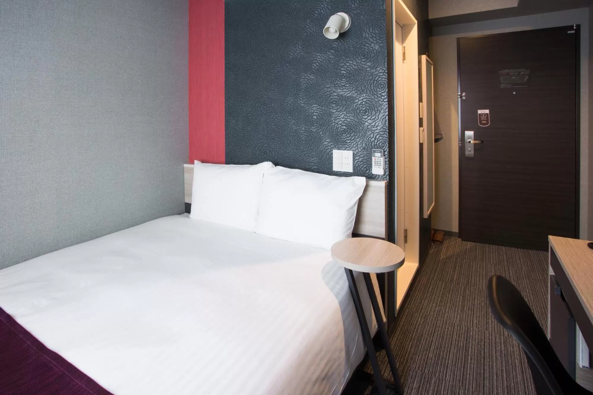 Bed in Kuretake Inn Nagoya Hisayaodori