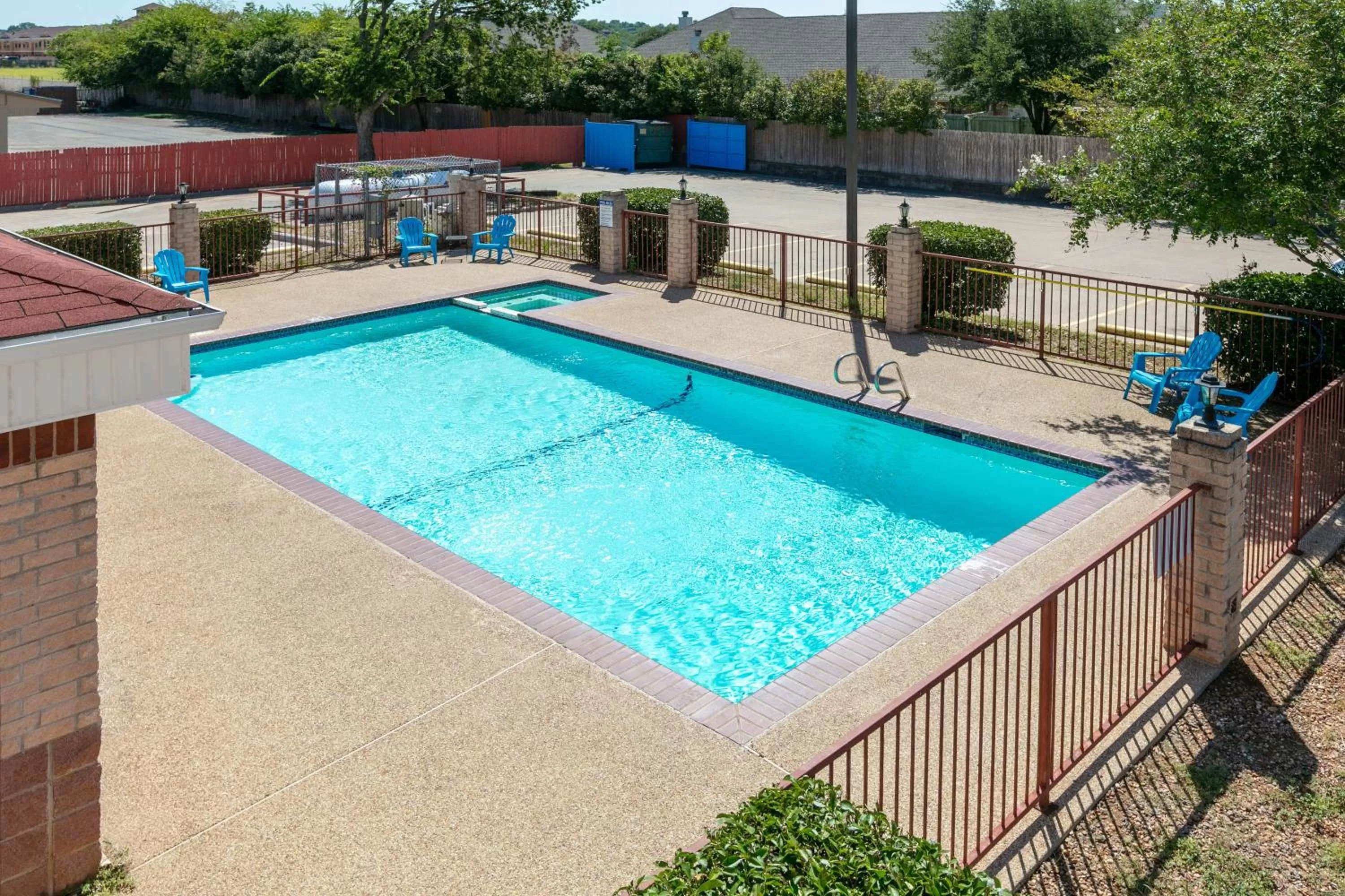 Swimming pool in Days Inn by Wyndham Granbury