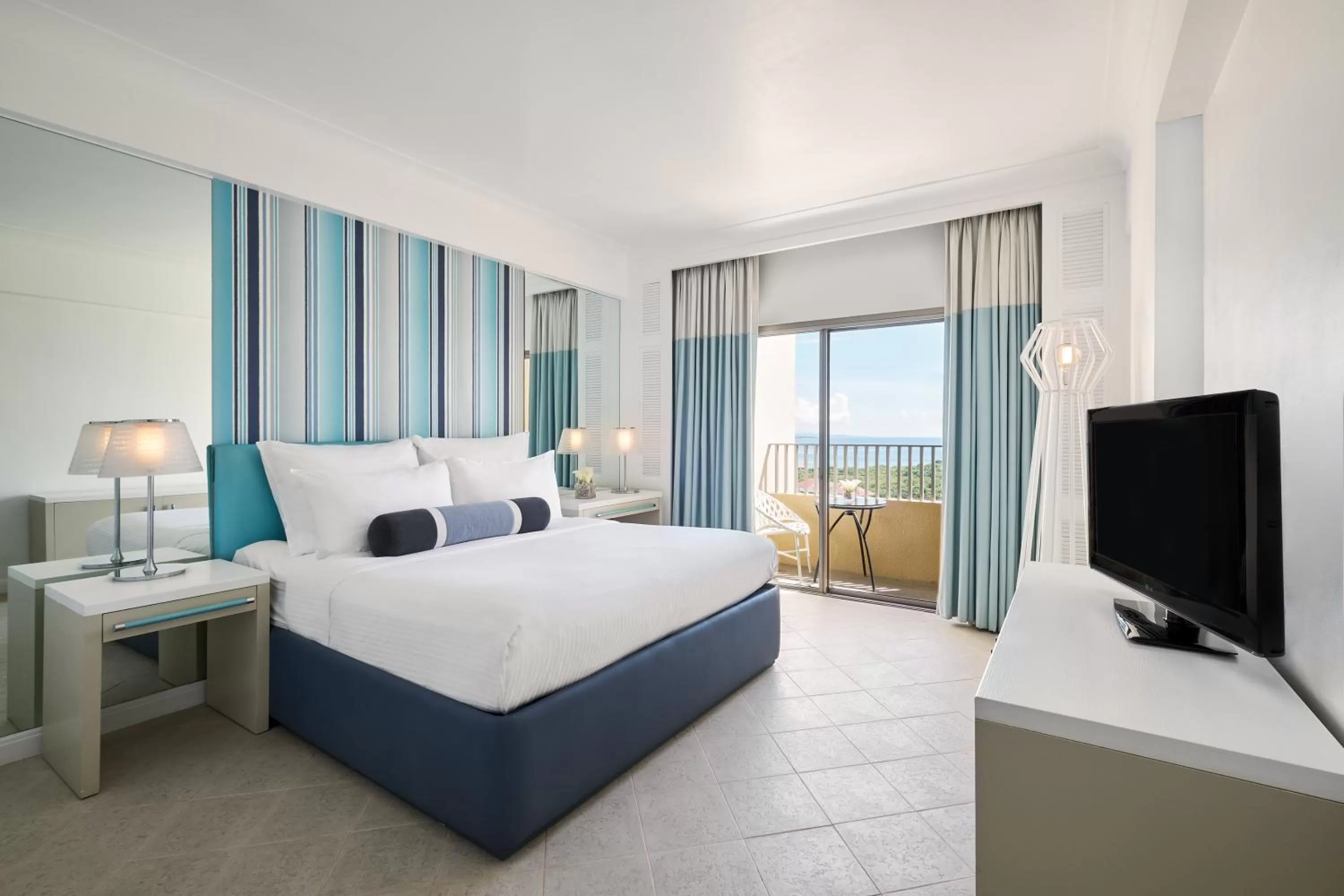 Photo of the whole room, Bed in Mövenpick Hotel Mactan Island Cebu