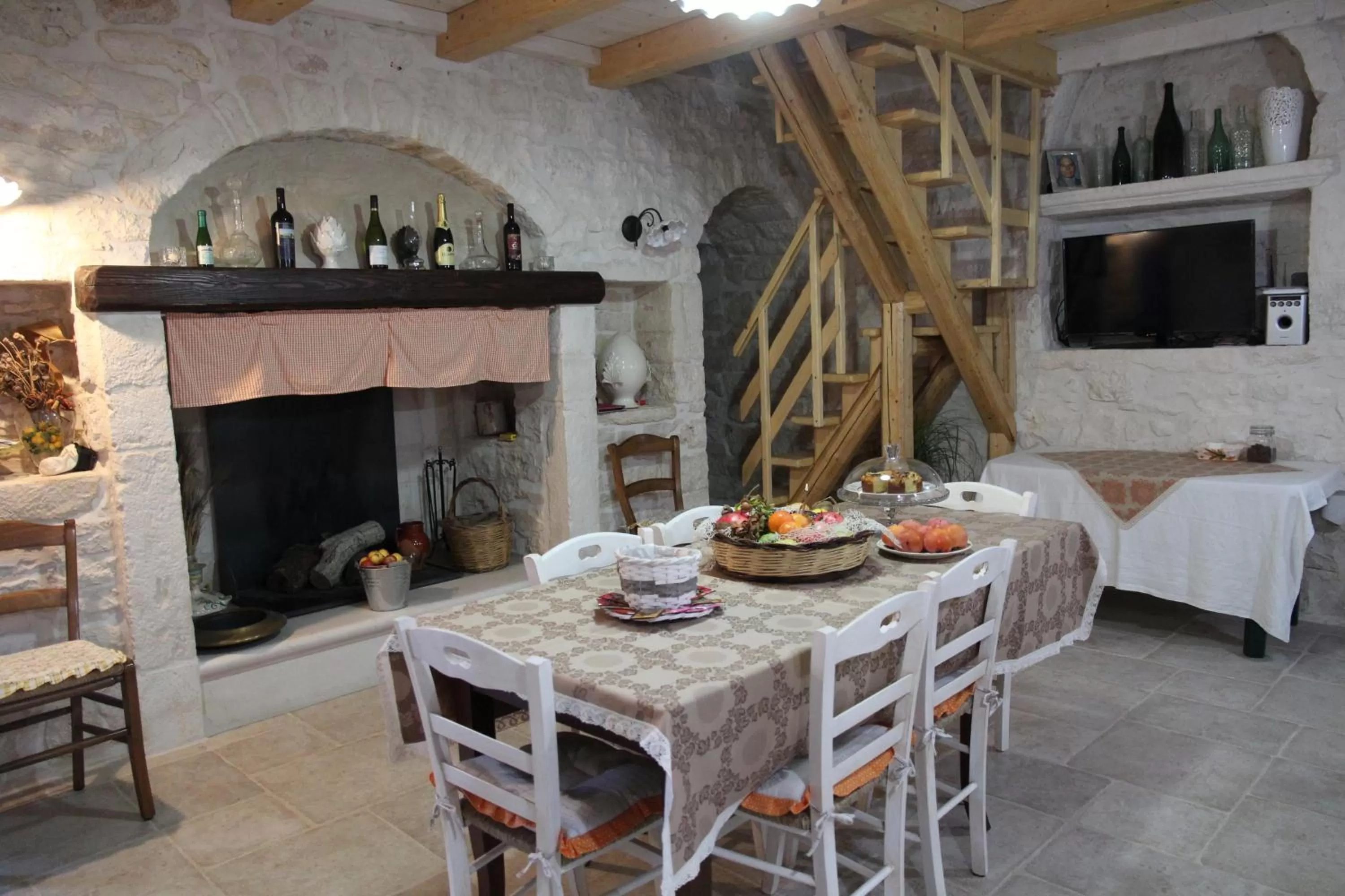 Communal lounge/ TV room in Trulli Donna Isabella