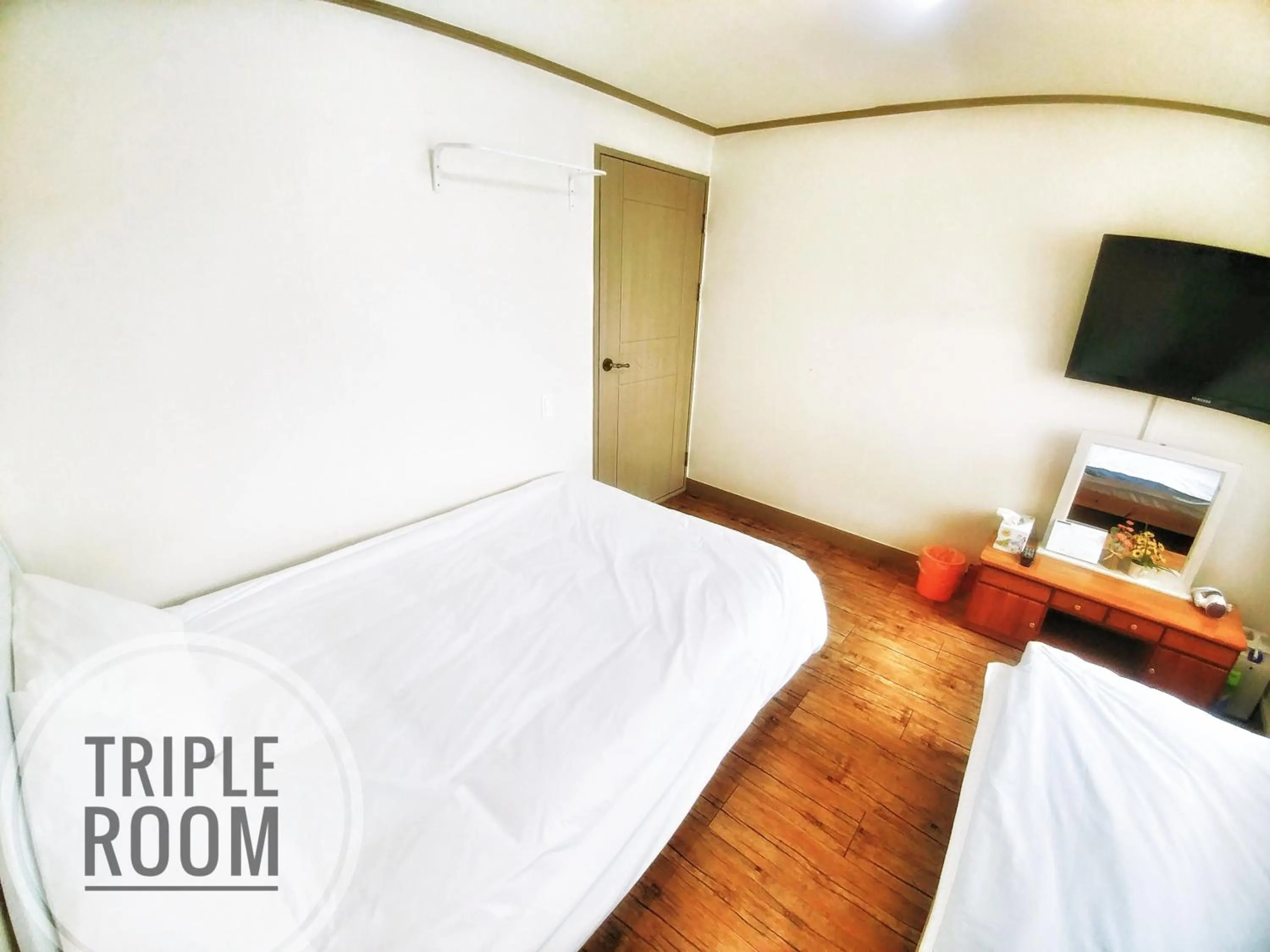 Bed in Jeju Masil Guesthouse