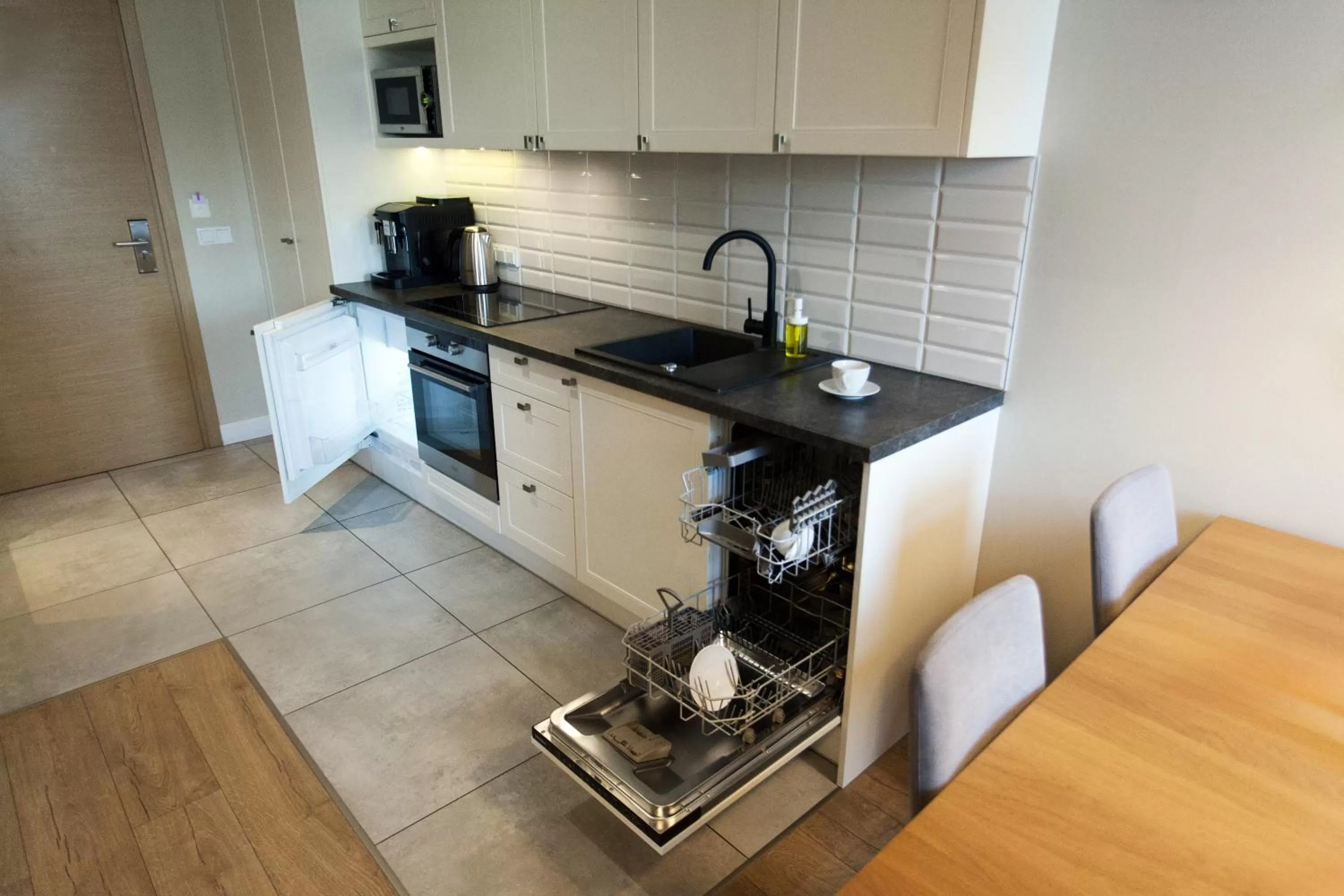 Kitchen or kitchenette in Riverside Aparthotel Cracow