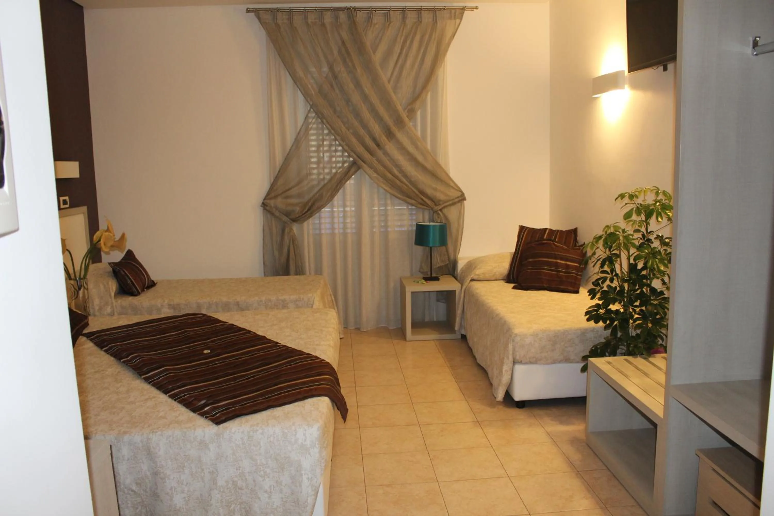 Bed in Artemisia Palace Hotel